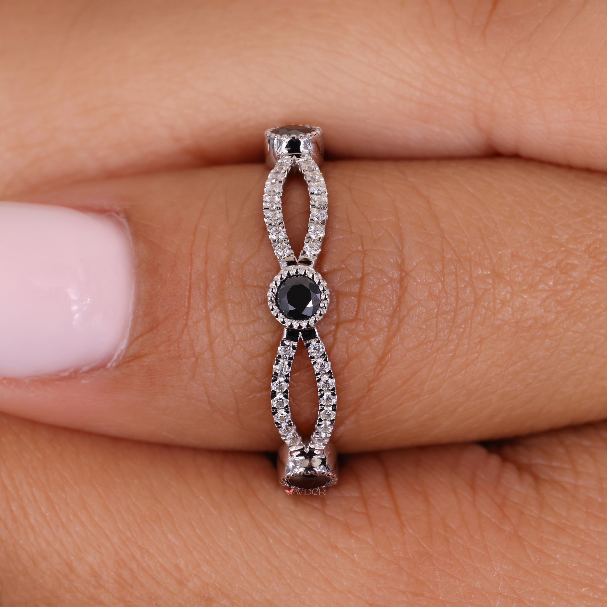 Moissanite eternity band in an elegant infinity wedding band.