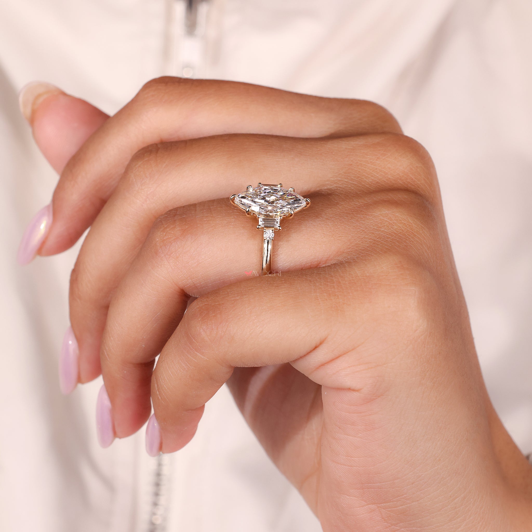 Prong setting ring designed to hold each of the five lab grown diamonds in place.
