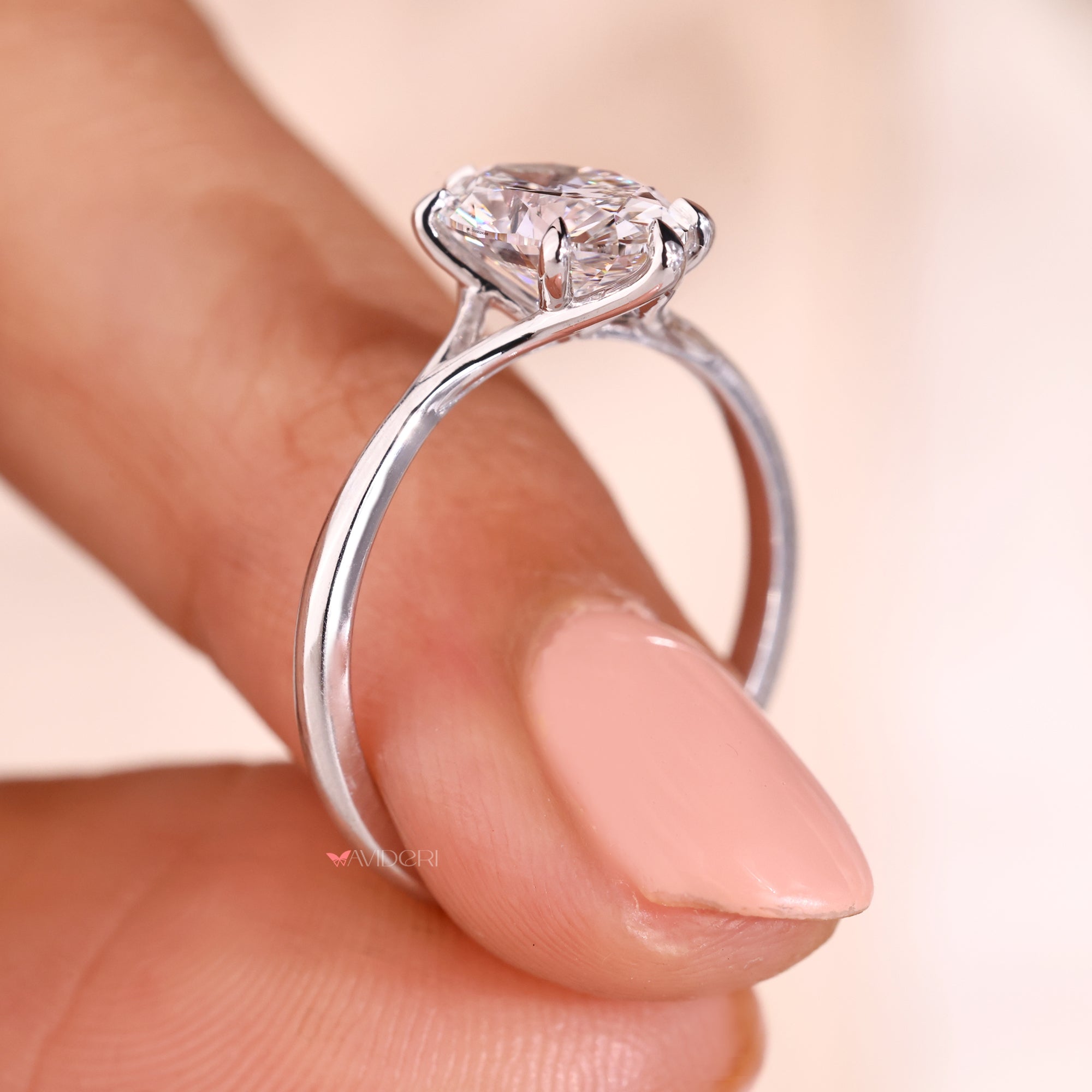 Prong set diamond ring in white gold for elegant proposals.