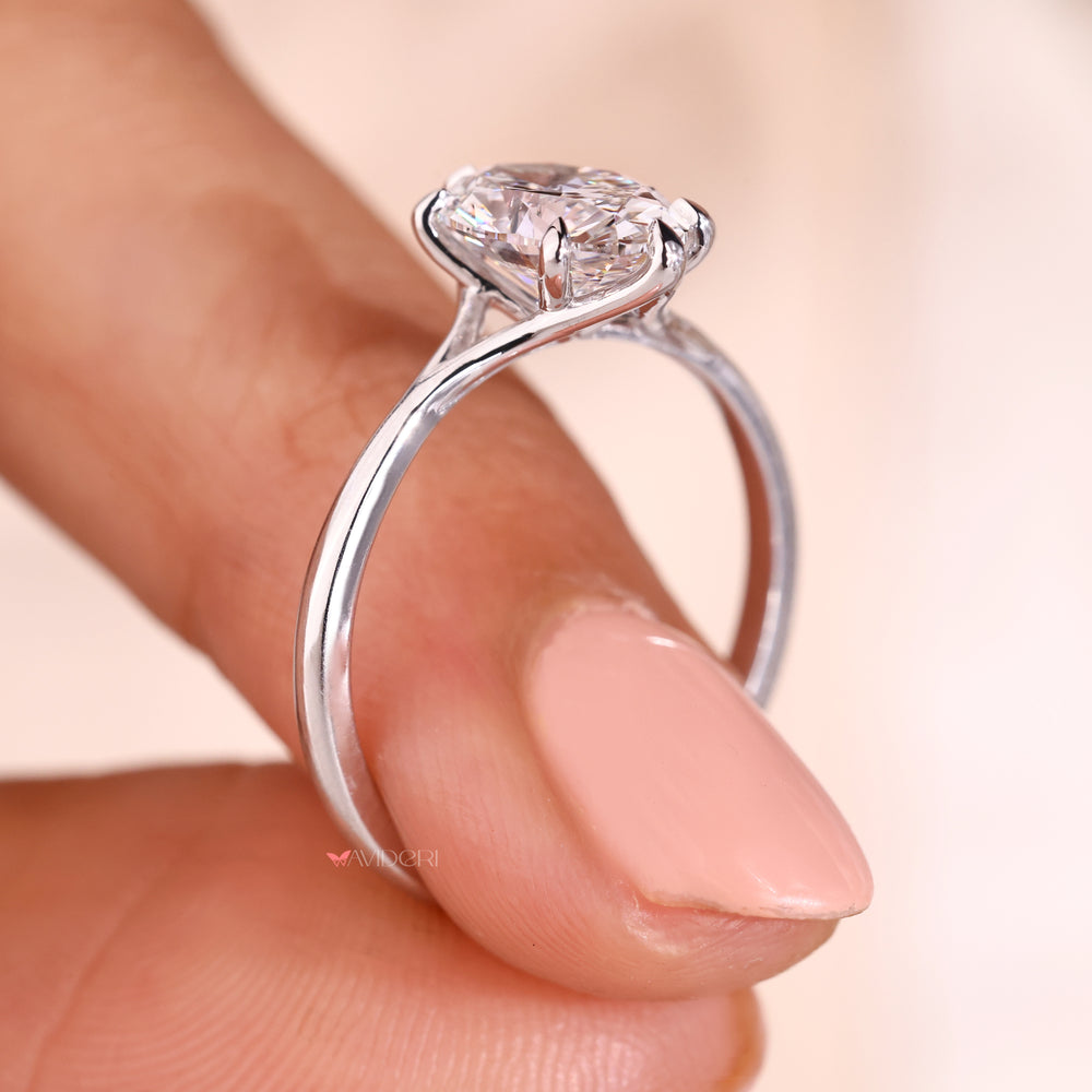 Prong set diamond ring in white gold for elegant proposals.