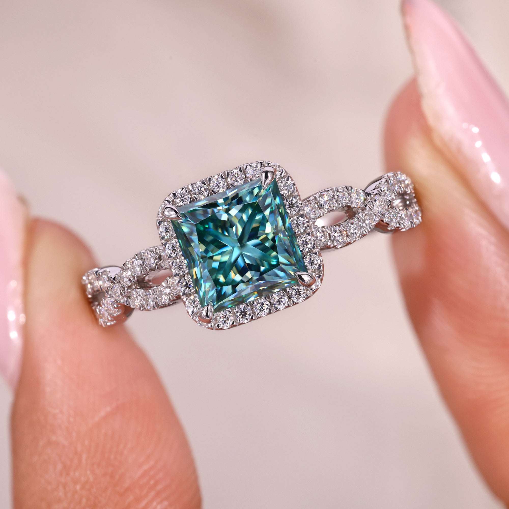 Halo princess cut ring setting designed for added brilliance.