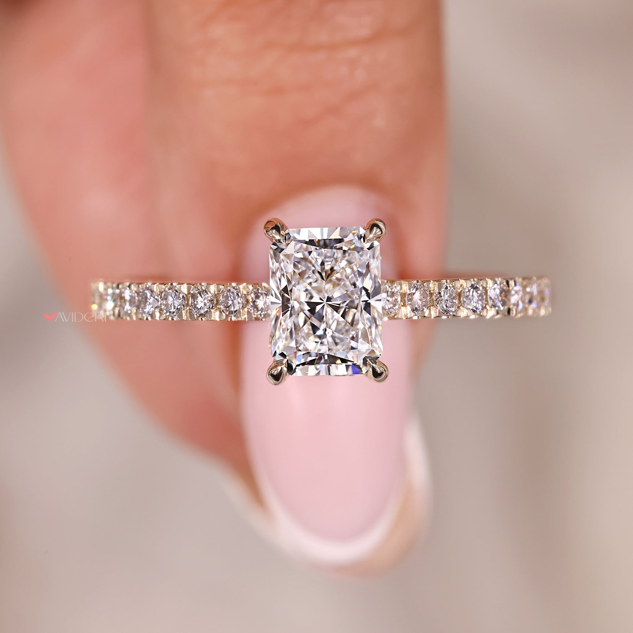 Prong setting, radiant engagement ring, yellow gold ring.
