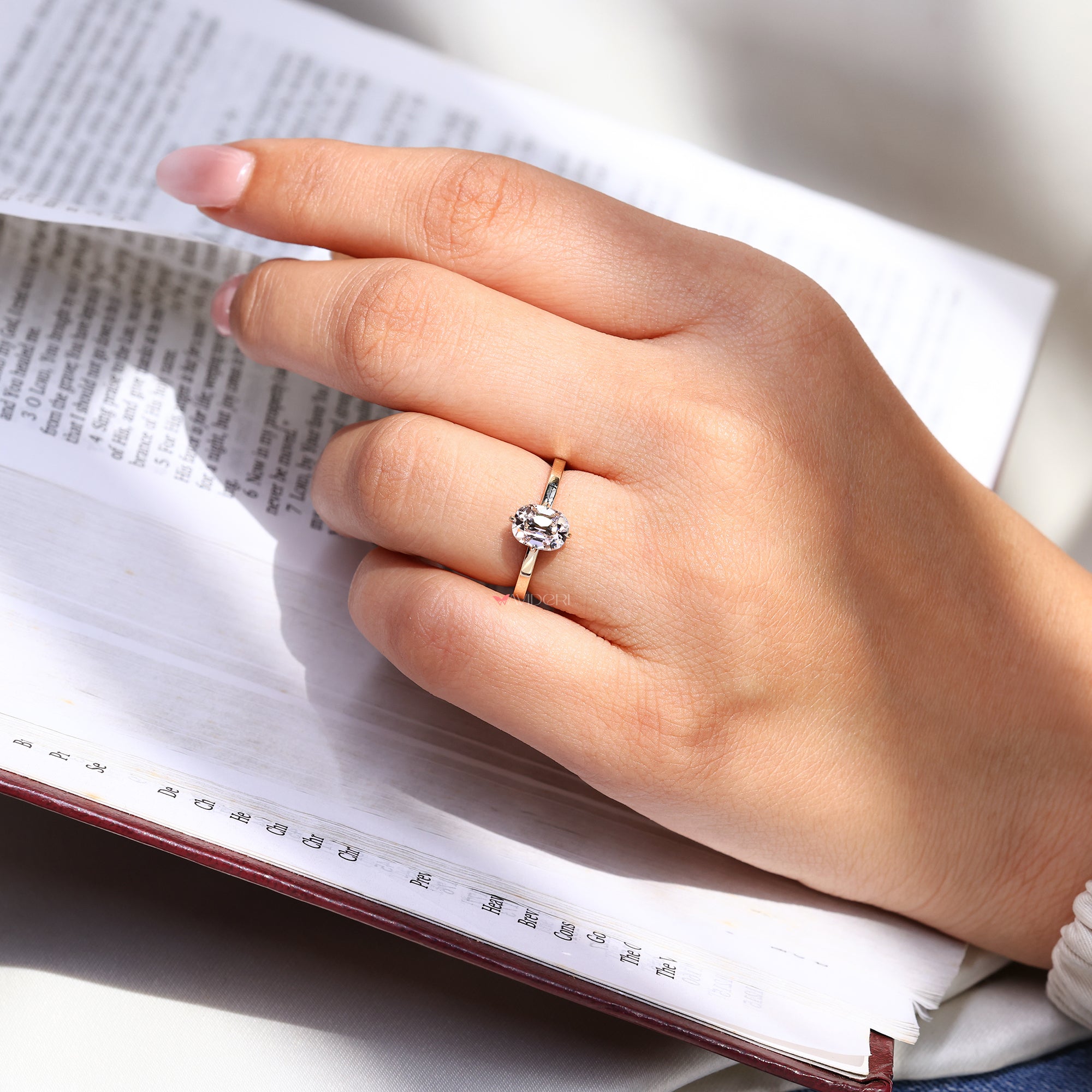 Cushion Cut Diamond Ring with a tulip setting.