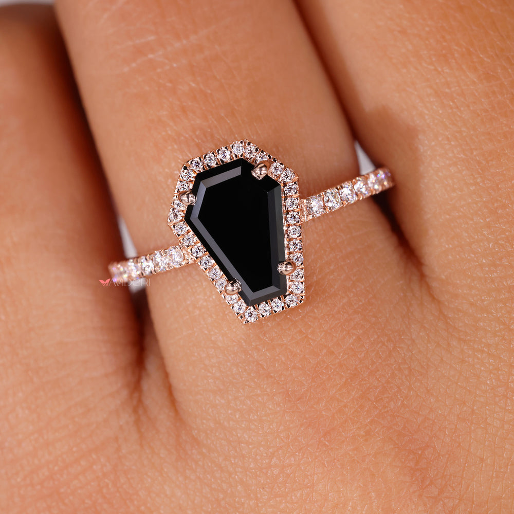 Secure 4 prong setting holding a radiant moissanite stone.
