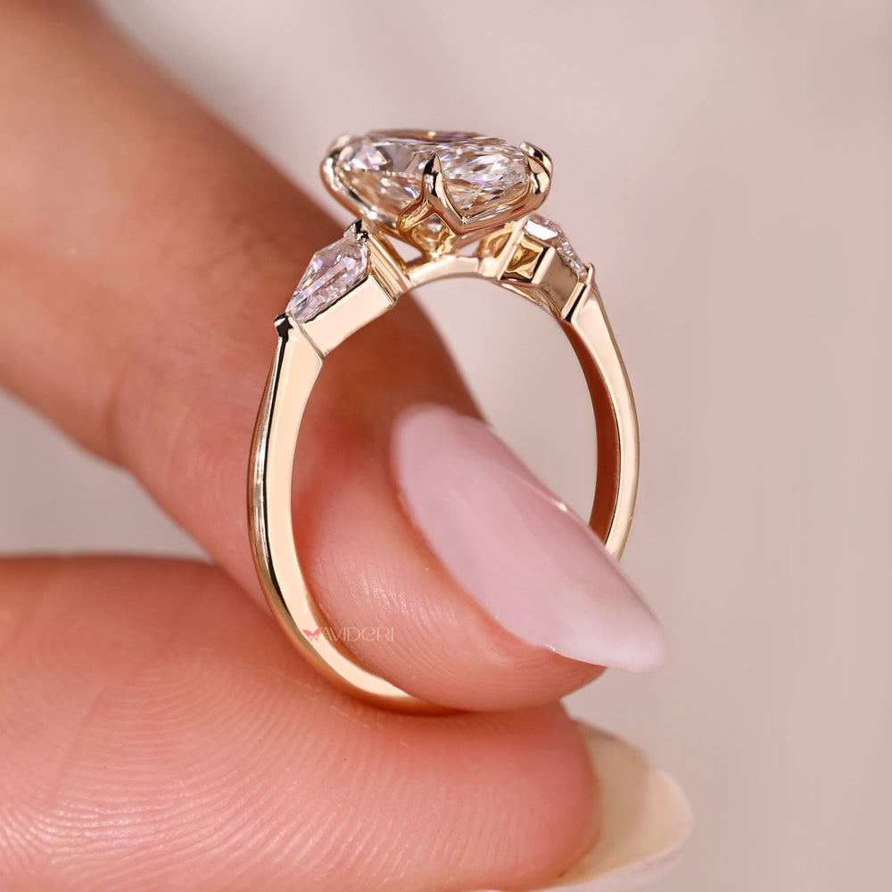 Lab grown marquise cut diamond ring with kite accents.