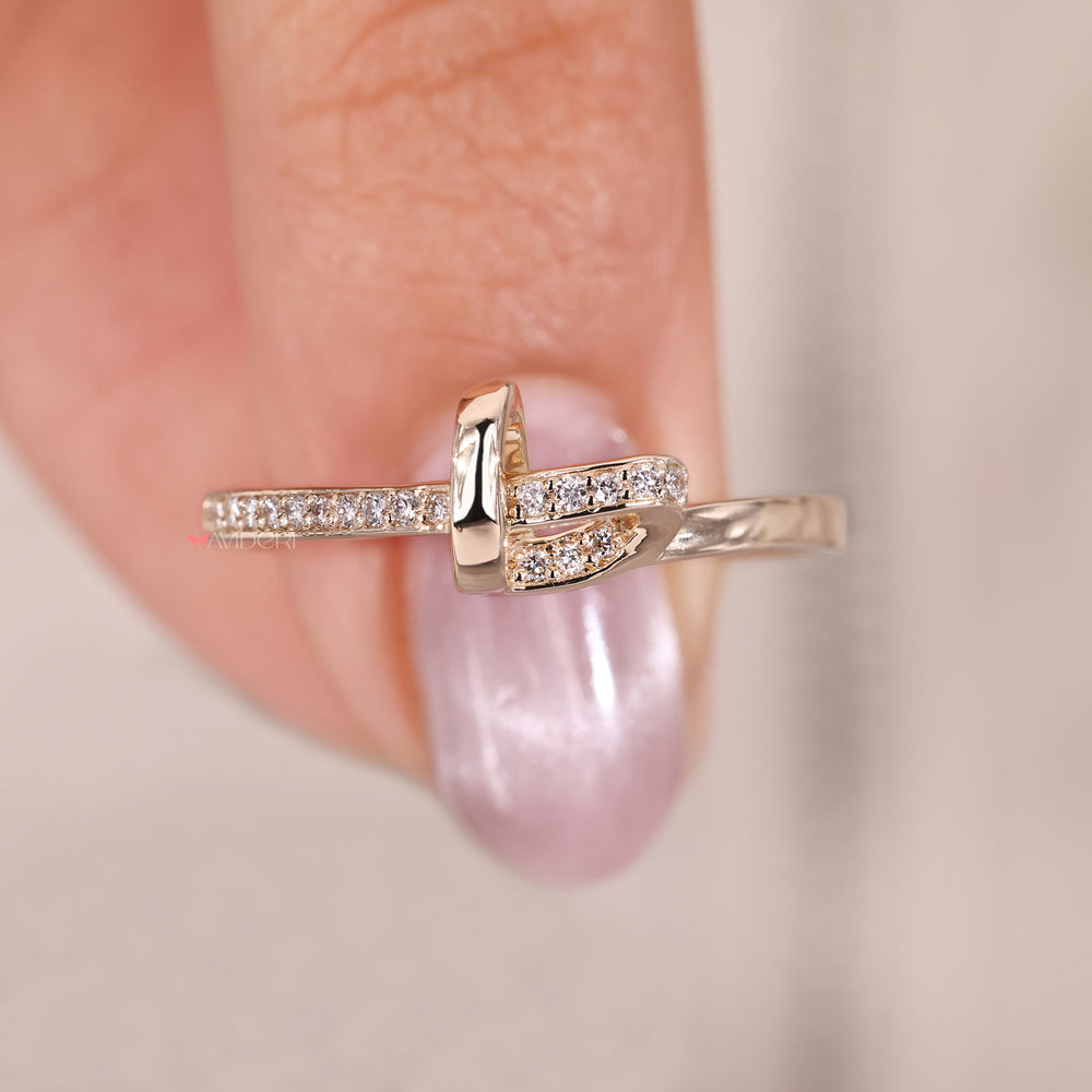 Diamond accent knot band designed to represent unity and love.
