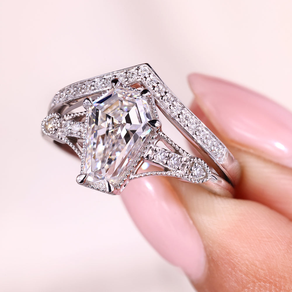 Six claw prong ring shown with curved wedding band for a complete bridal set.