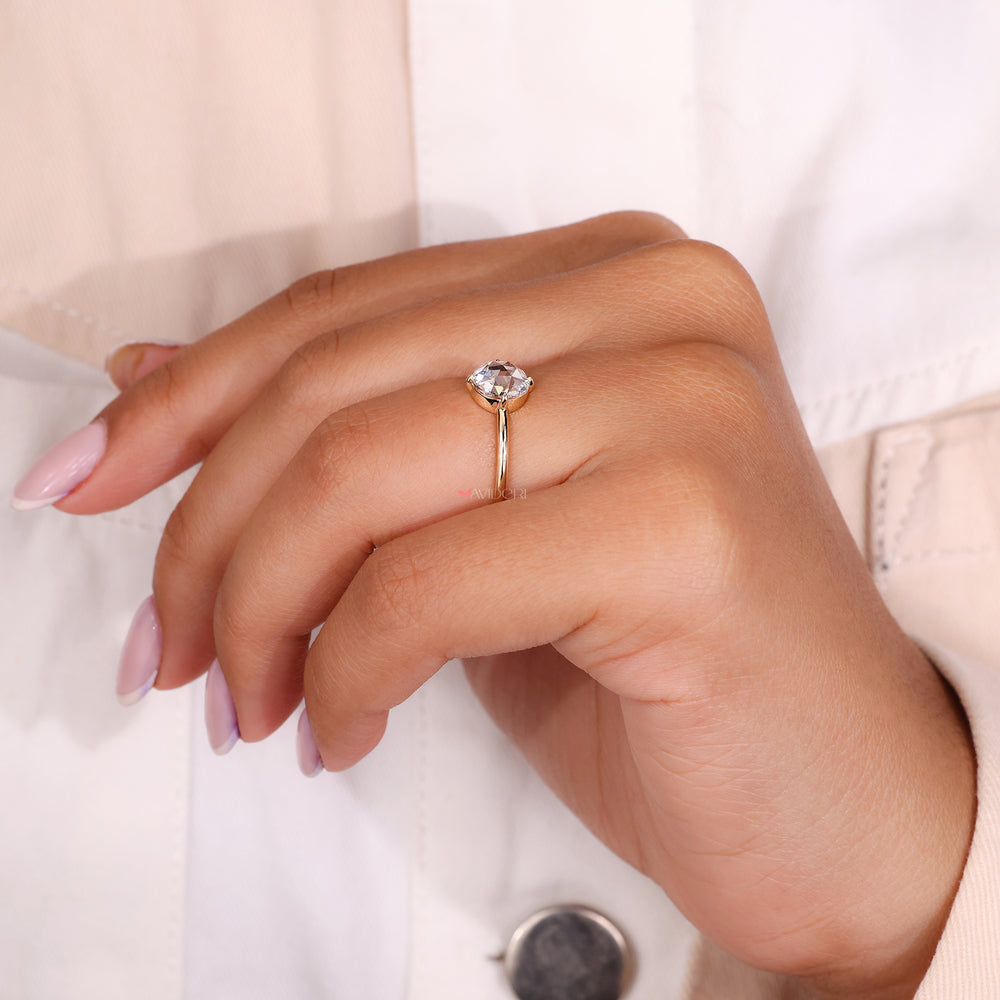Yellow gold diamond ring with a 4 prong claw setting.