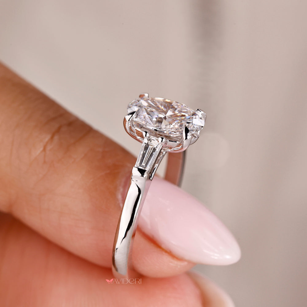 White gold jewellery ring with an oval shaped diamond for a timeless appeal.
