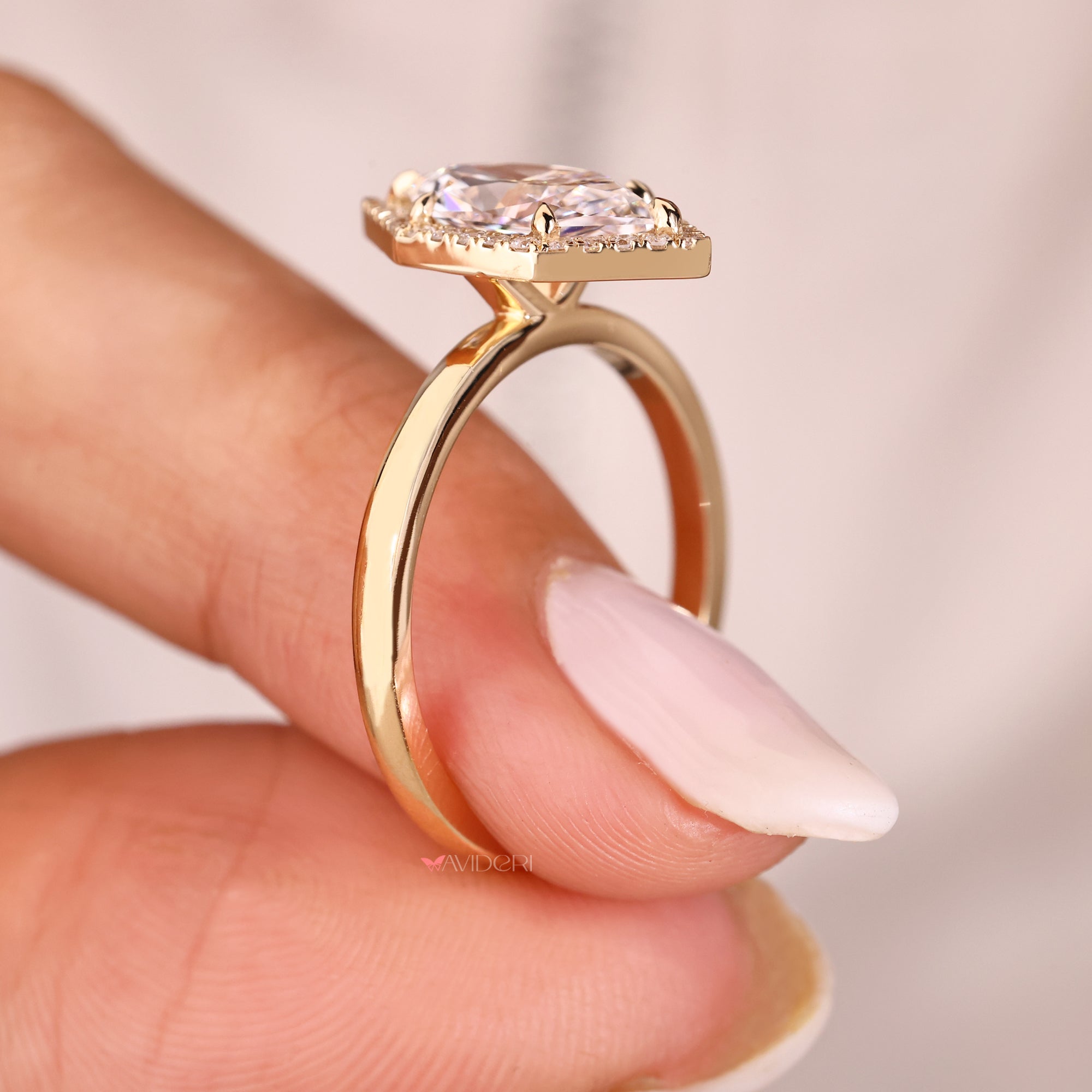 Custom engagement ring includes handmade ring.