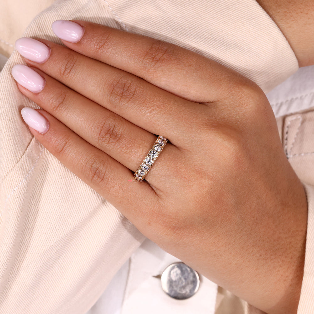 Round diamond wedding band set in a yellow gold eternity band for brilliance