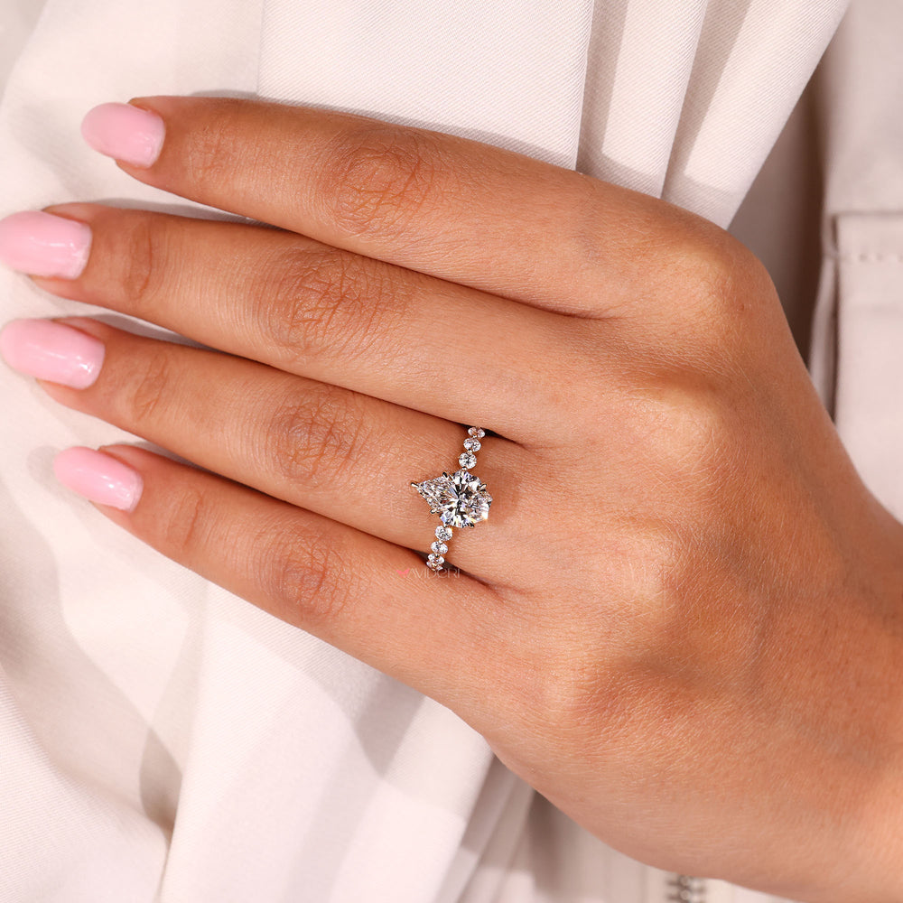 Round cut band ring set in shared prong design.