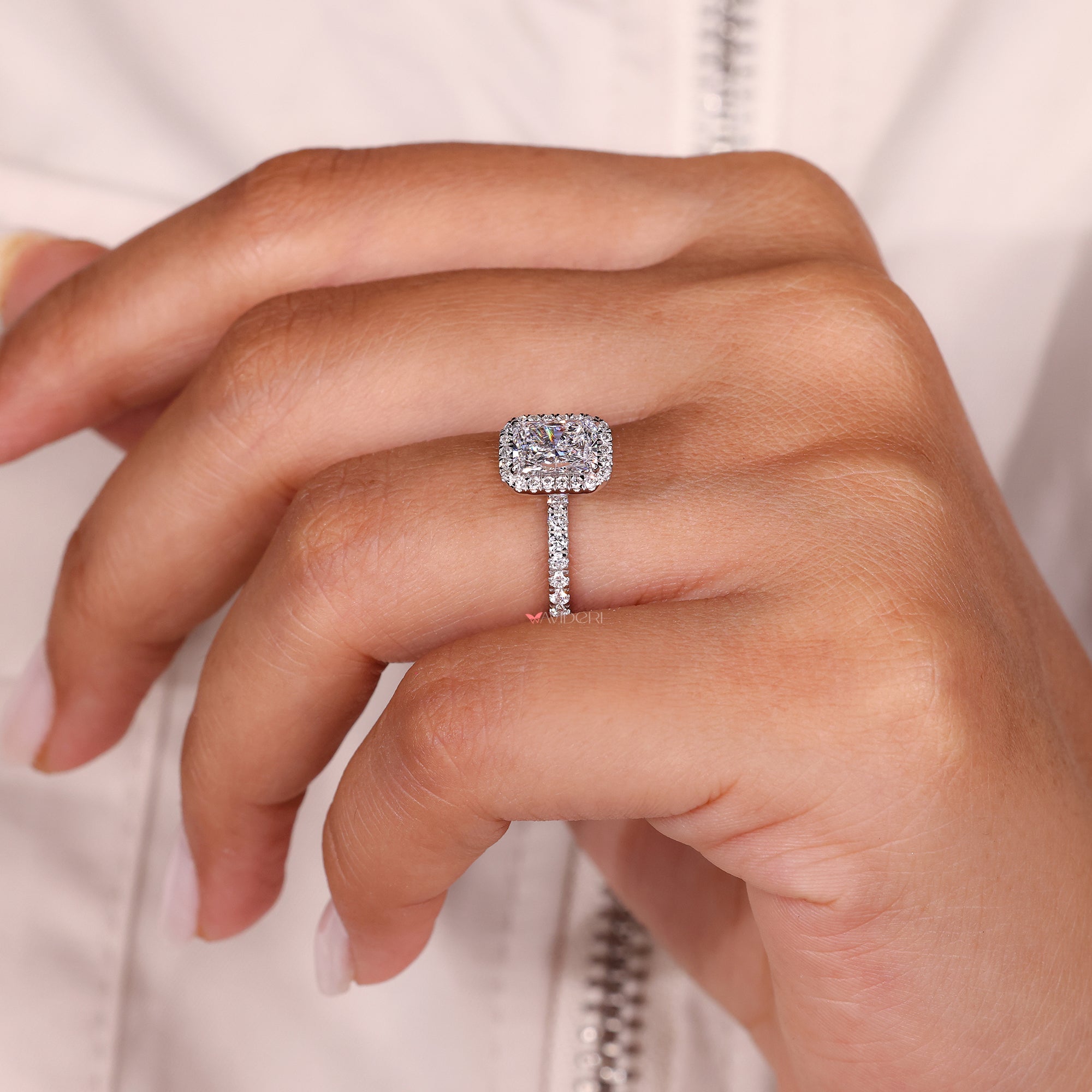 Radiant diamond ring with handcrafted pave setting.