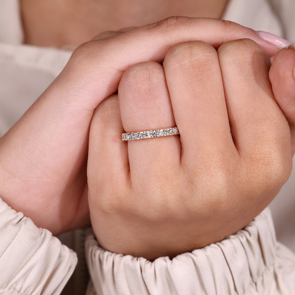 Lab grown diamond prong set eternity band.
