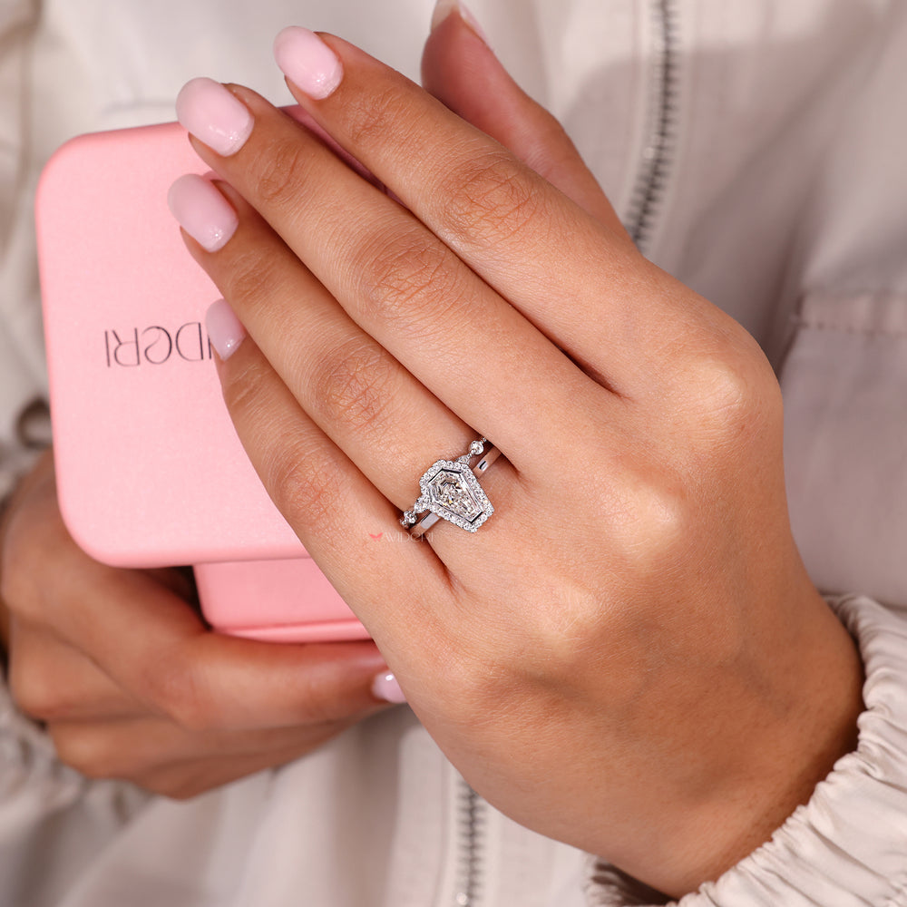 Coffin cut engagement ring with a matching band.