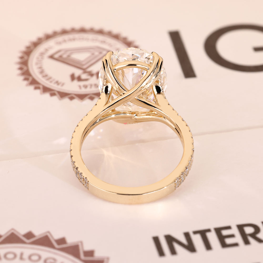 Oval lab grown diamond ring with round pave.
