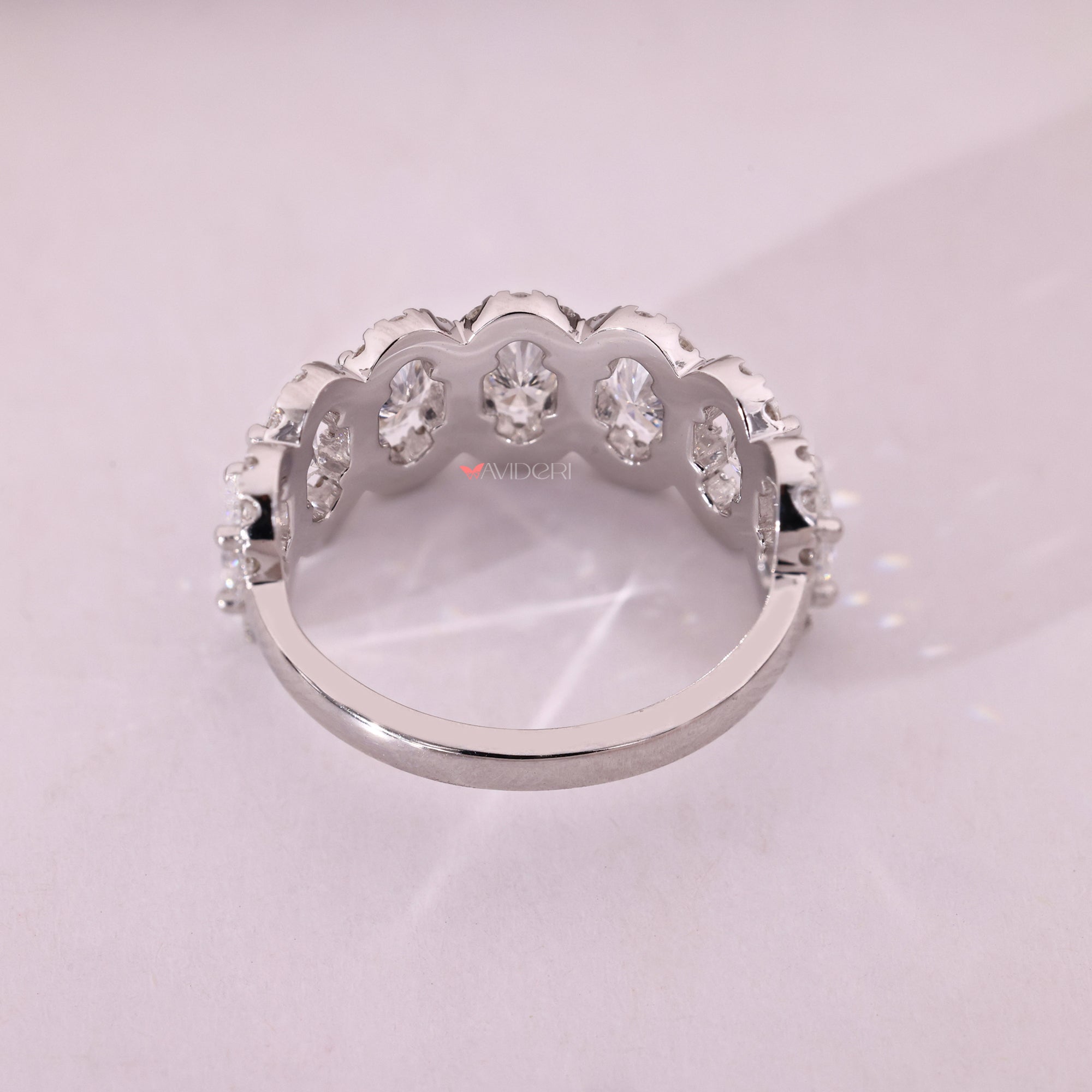 White gold wedding band with Lab Grown Diamonds.
