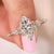 Marquise diamond engagement ring in yellow gold on the Finger.