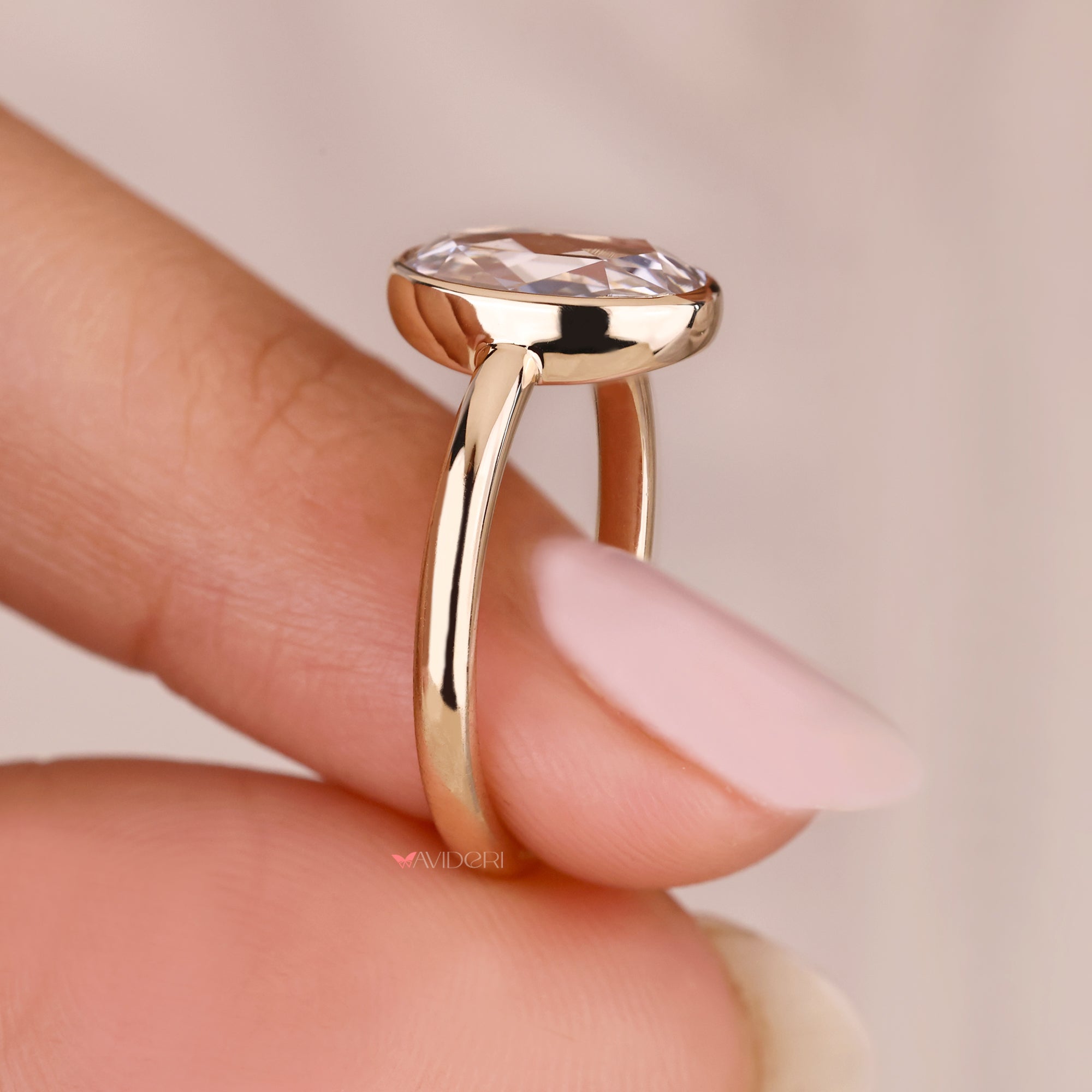 Lab grown oval rose cut diamond ring design.
