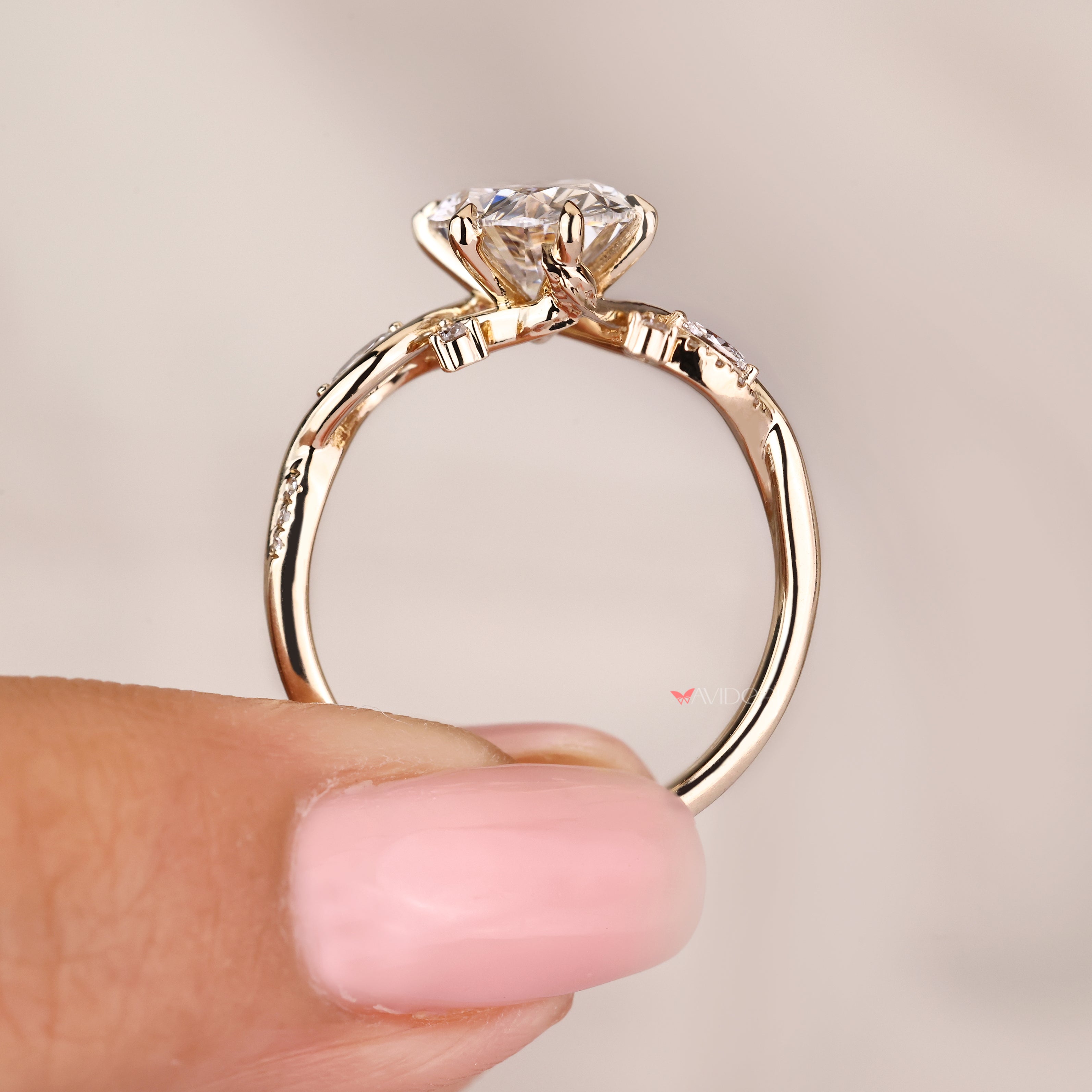 Lab grown oval diamond ring with six claw prong setting
