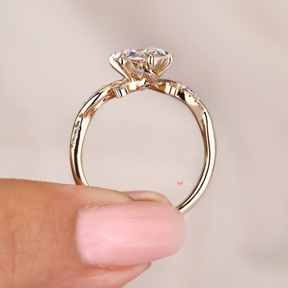 Lab grown oval diamond ring with six claw prong setting
