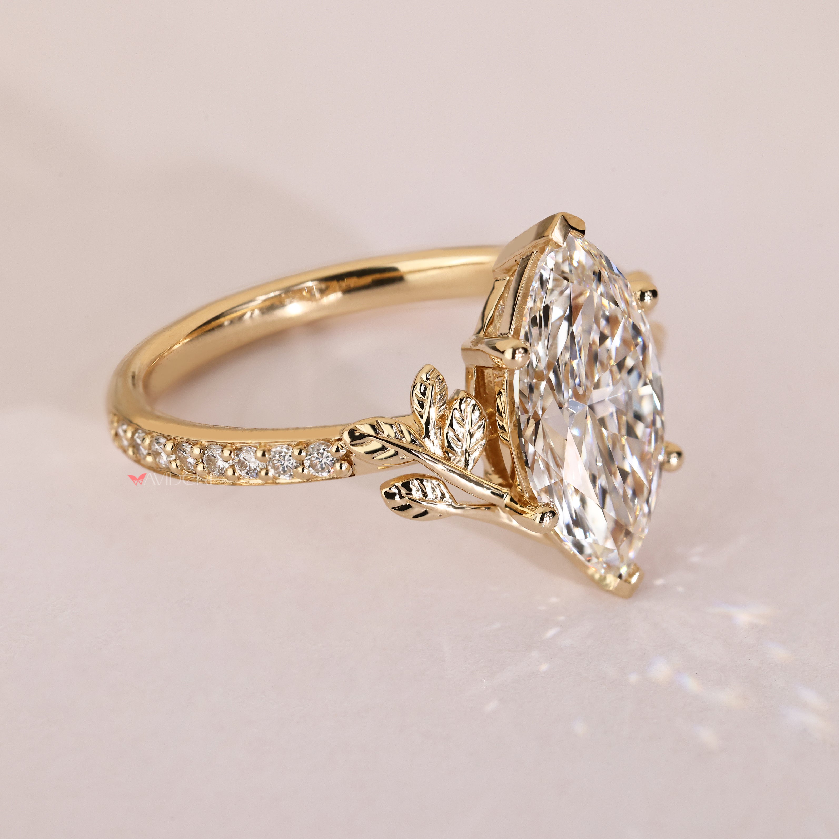 Handmade marquise diamond ring with two V shape prongs
