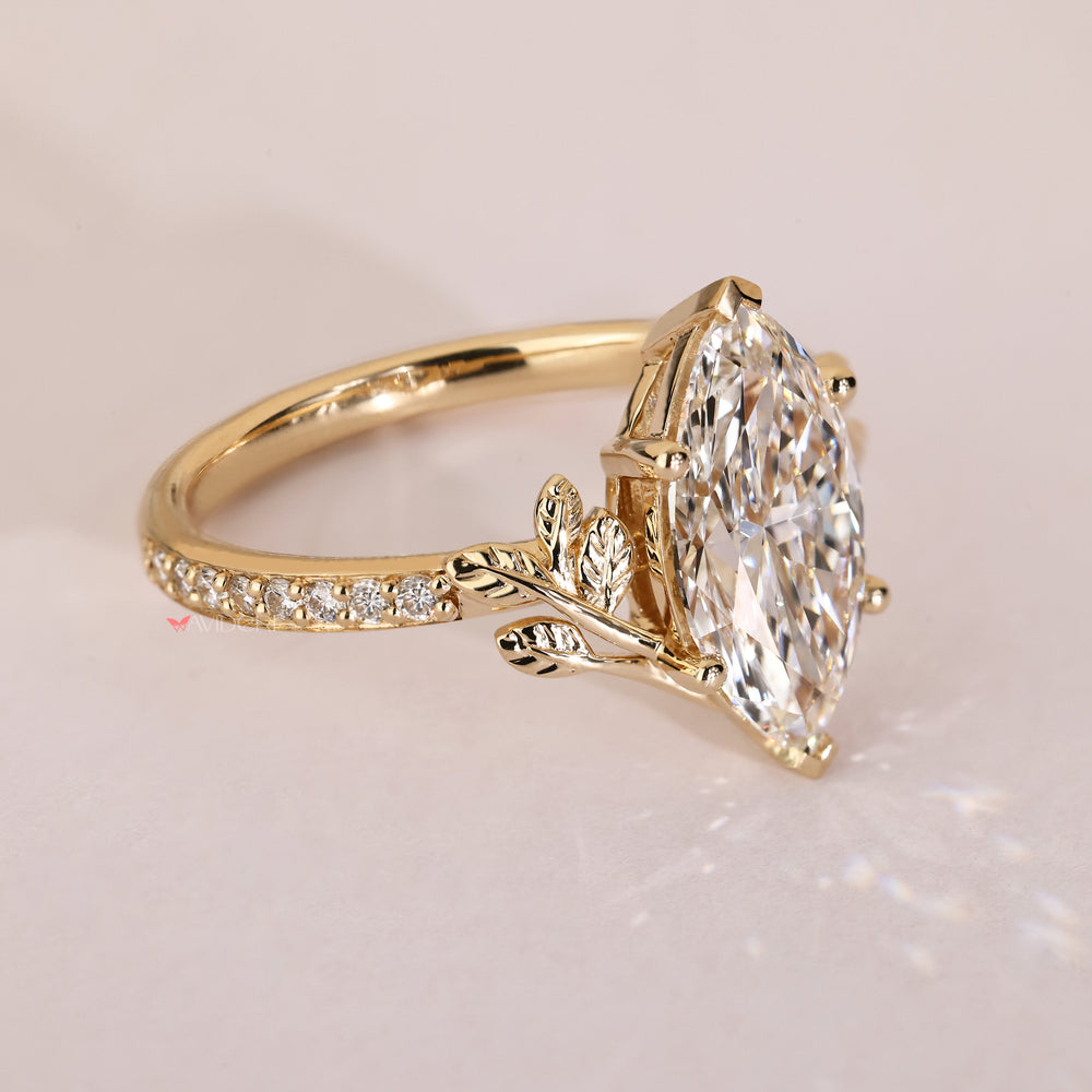 Handmade marquise diamond ring with two V shape prongs
