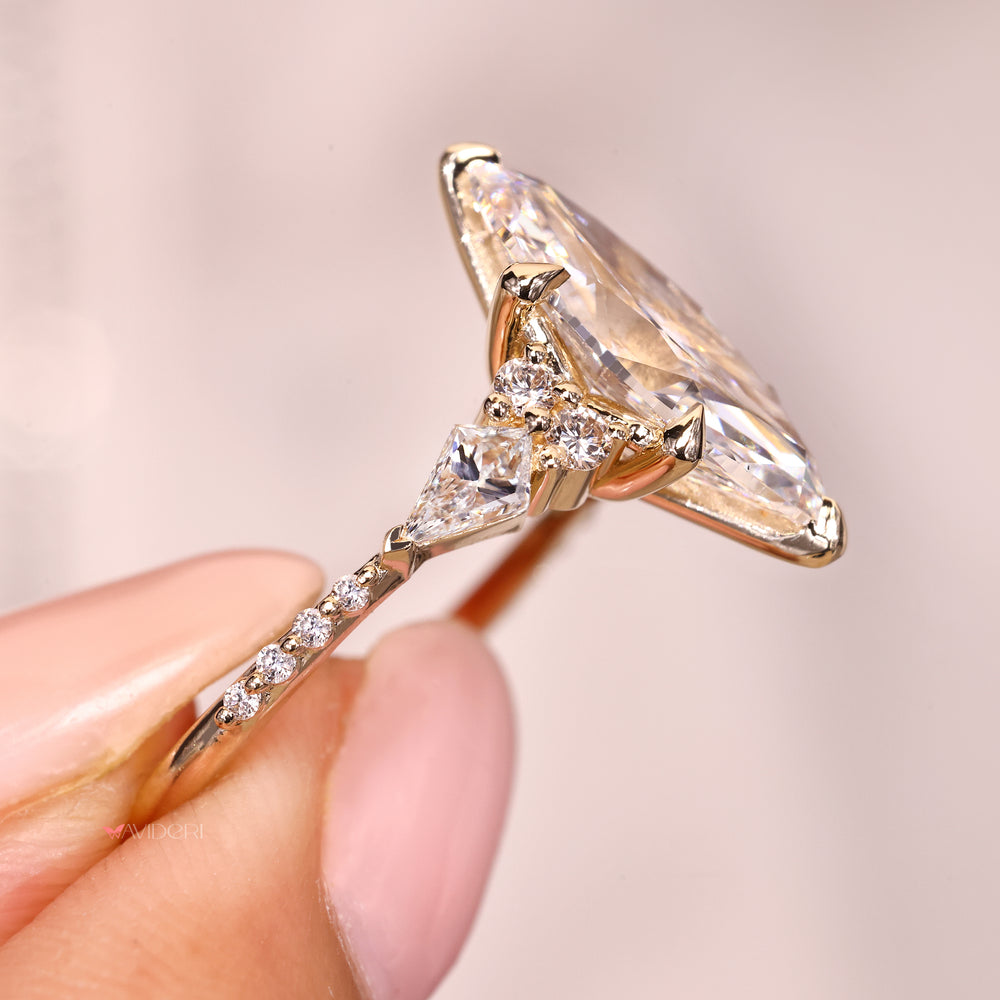 Marquise diamond ring with six claw prong setting style.
