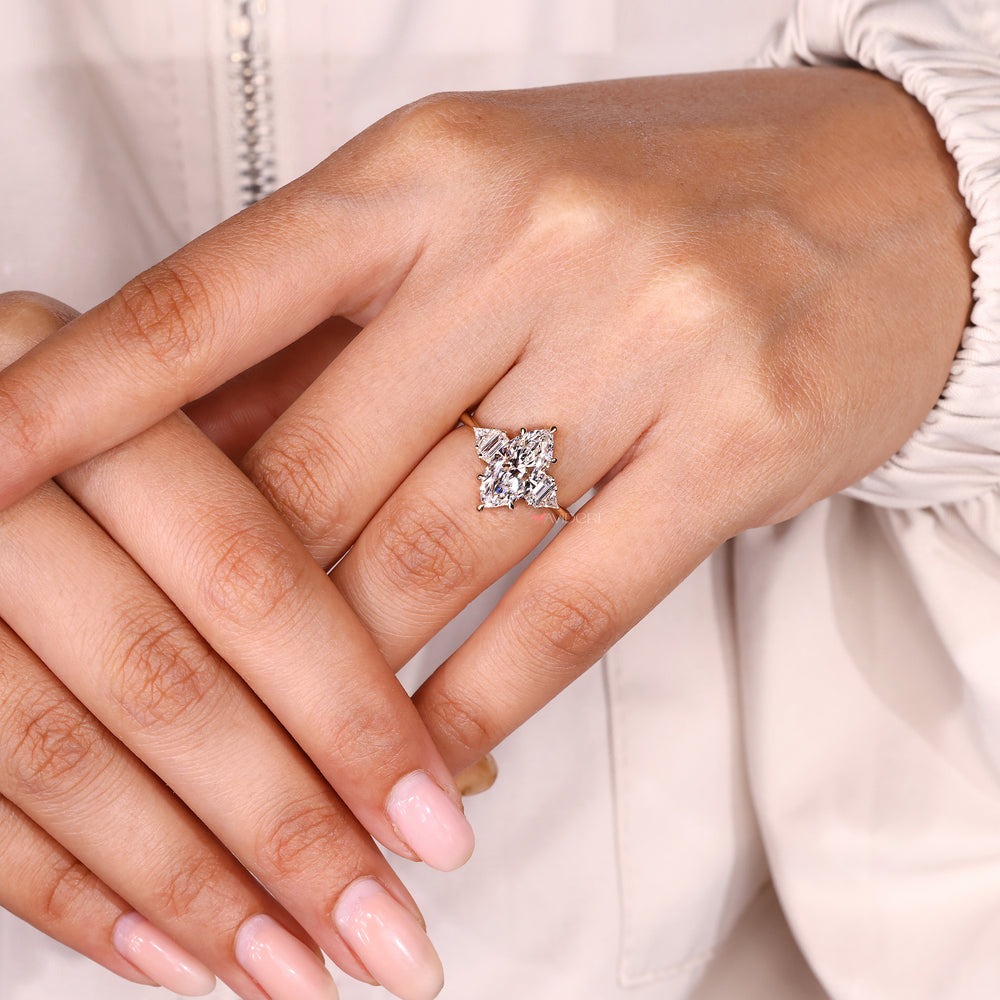 Handmade marquise diamond ring with tapered shank setting.
