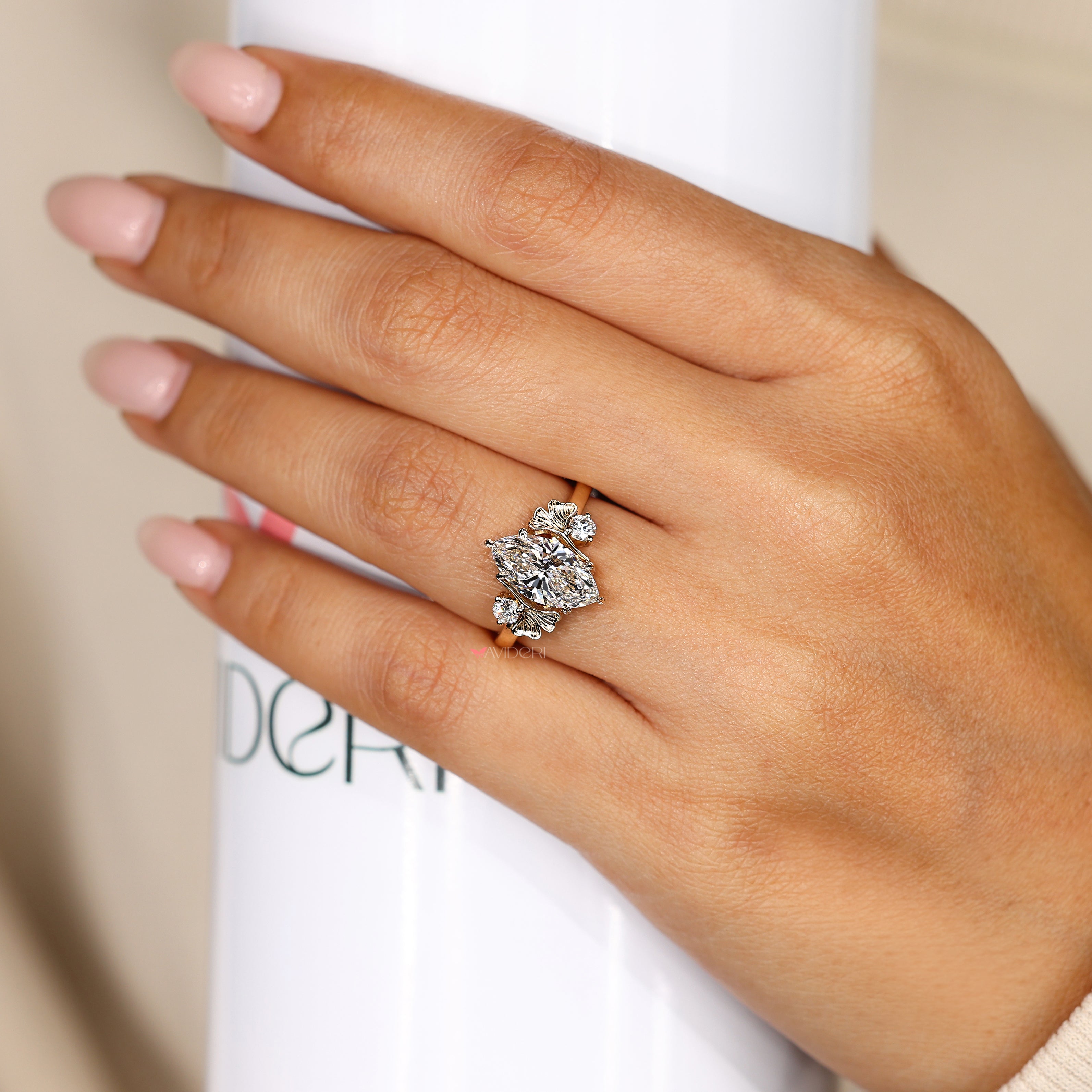 Handmade ginkgo leaf marquise diamond ring.
