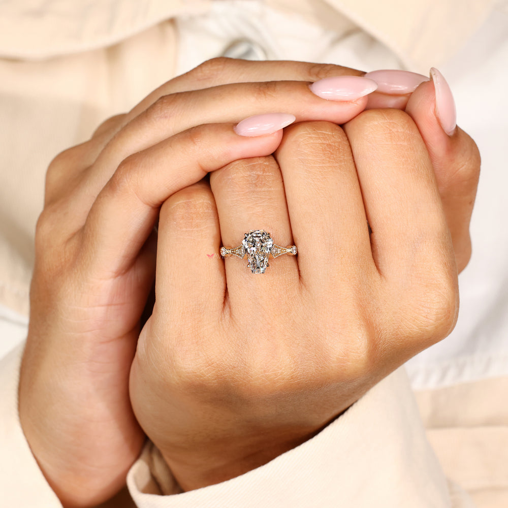 Coffin cut lab diamond ring with four claw prongs
