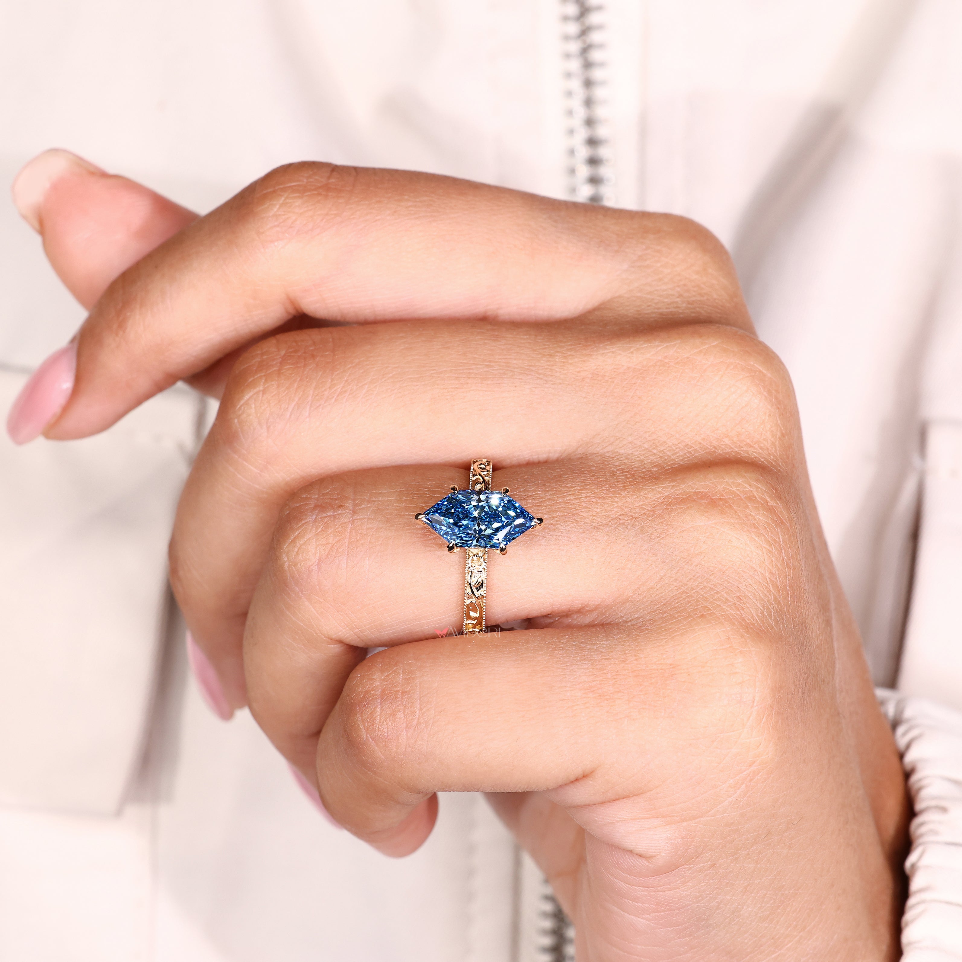 Dutch marquise engagement ring with milgrain and floral accents
