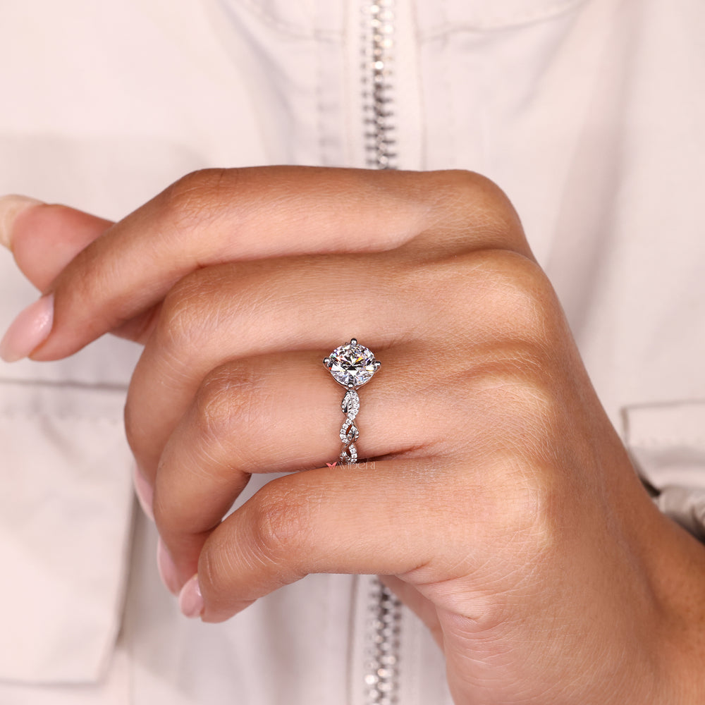 Compass prong round diamond ring design.

