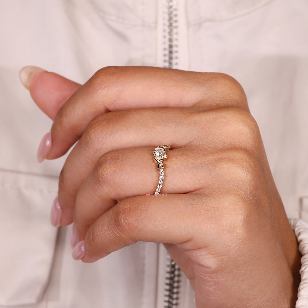 Pave style round diamond ring claddagh design.
