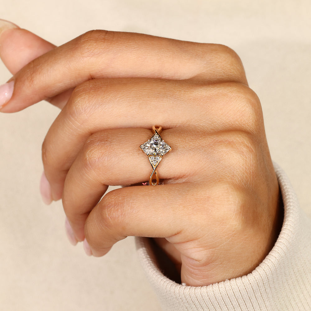 Lab grown marquise ring with round side stones.
