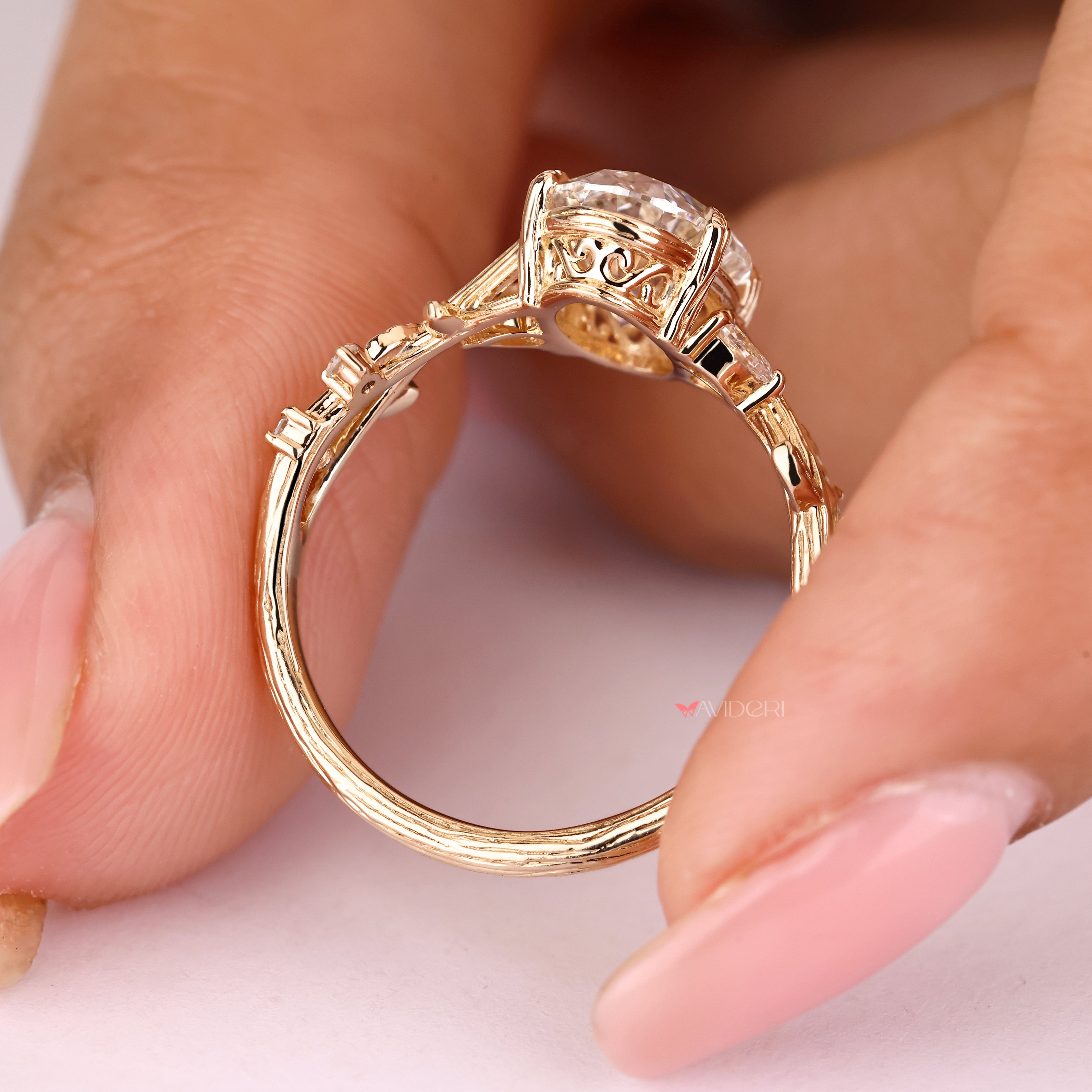 Lab grown oval diamond ring with split shank setting

