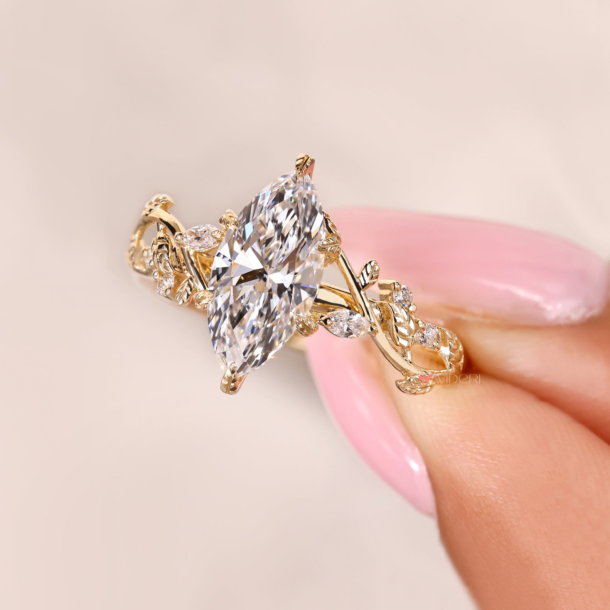 Lab grown marquise cut diamond ring nature inspired.
