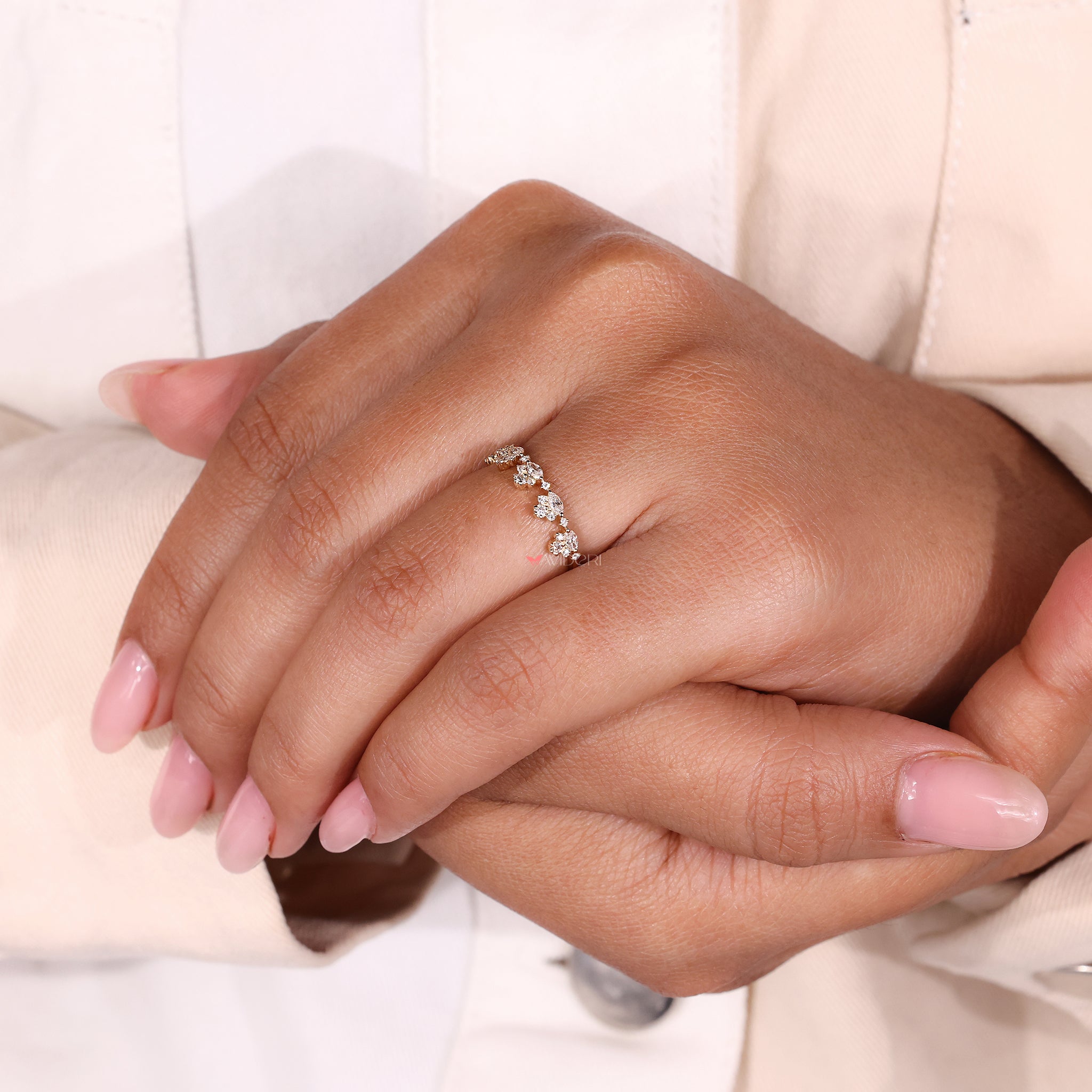 Half eternity diamond wedding band handcrafted with a mix of shapes and secure settings.
