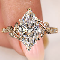 Nature Inspired Marquise Cut Diamond Ring In Art Deco