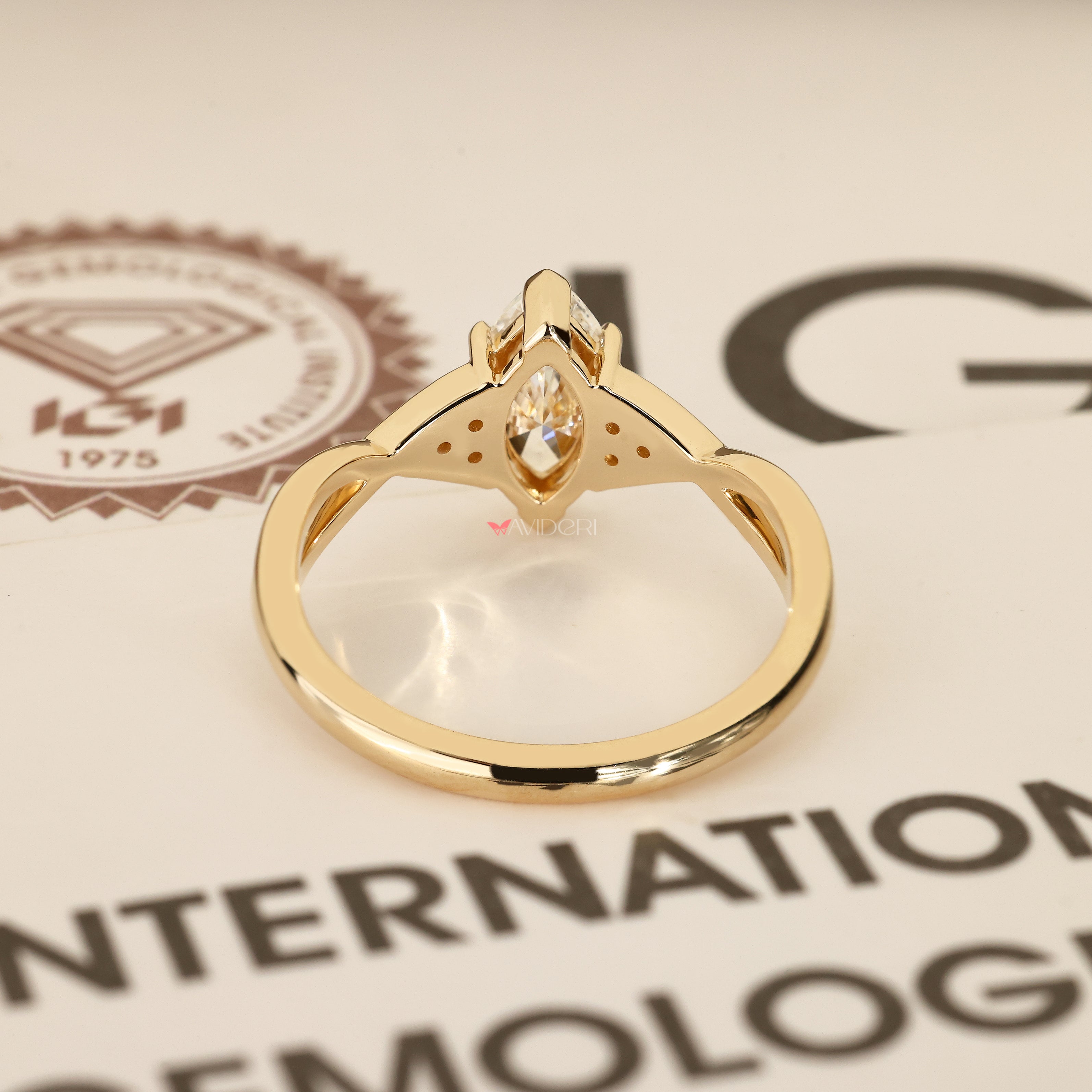 Handmade marquise diamond ring with claw prongs.
