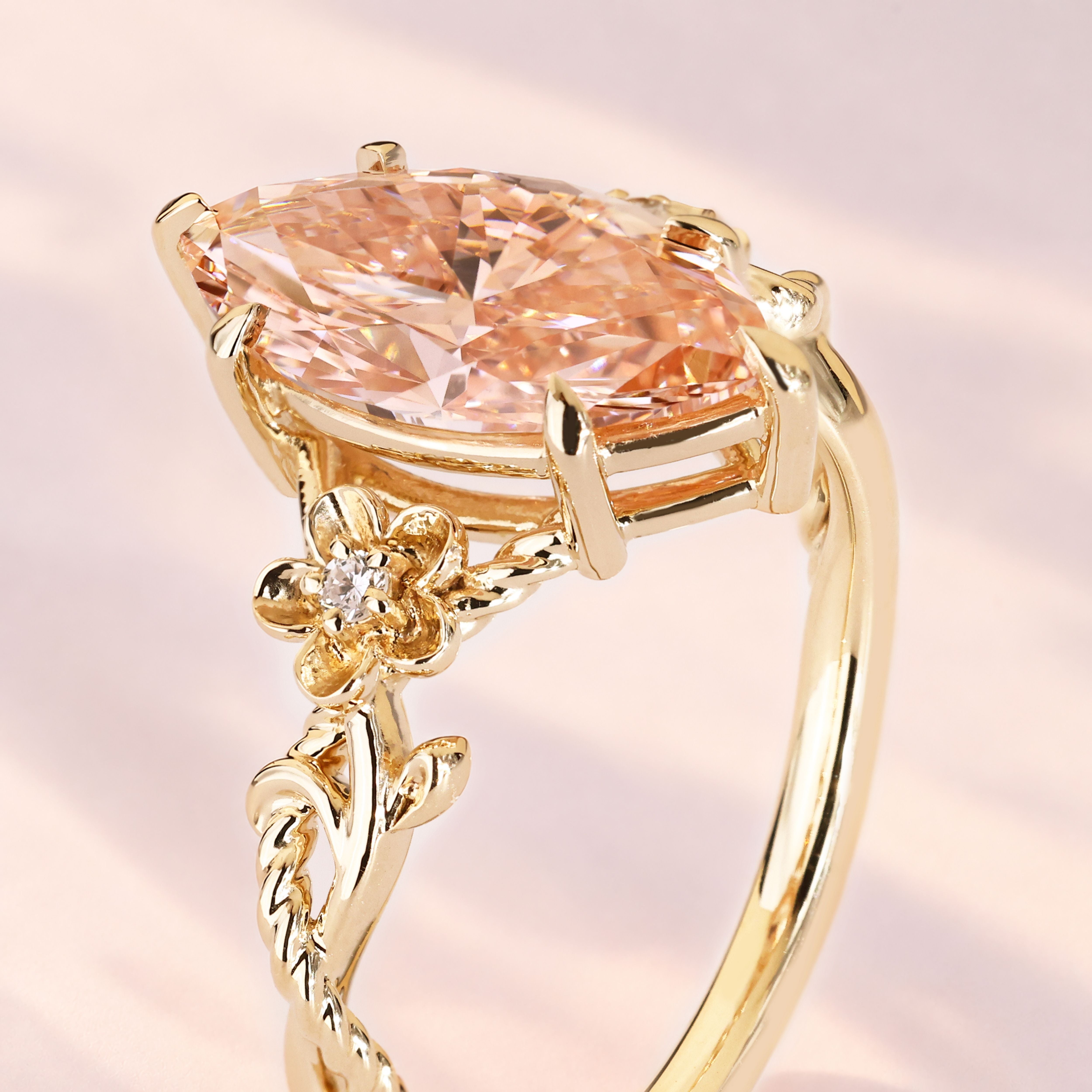 Marquise diamond ring with twisted rope band.
