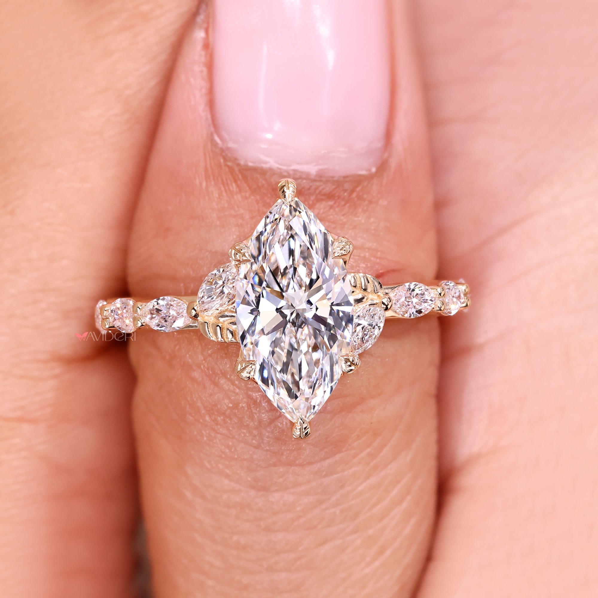Cathedral setting marquise diamond ring design.
