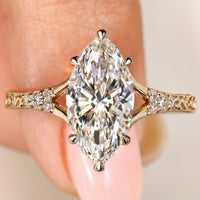 Marquise Cut Engagement Ring With Side Stone In Split Shank