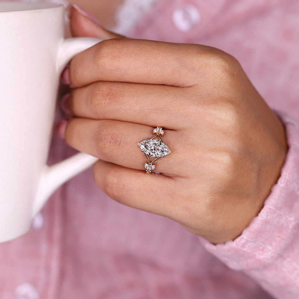 Nature inspired marquise diamond ring with split shank setting
