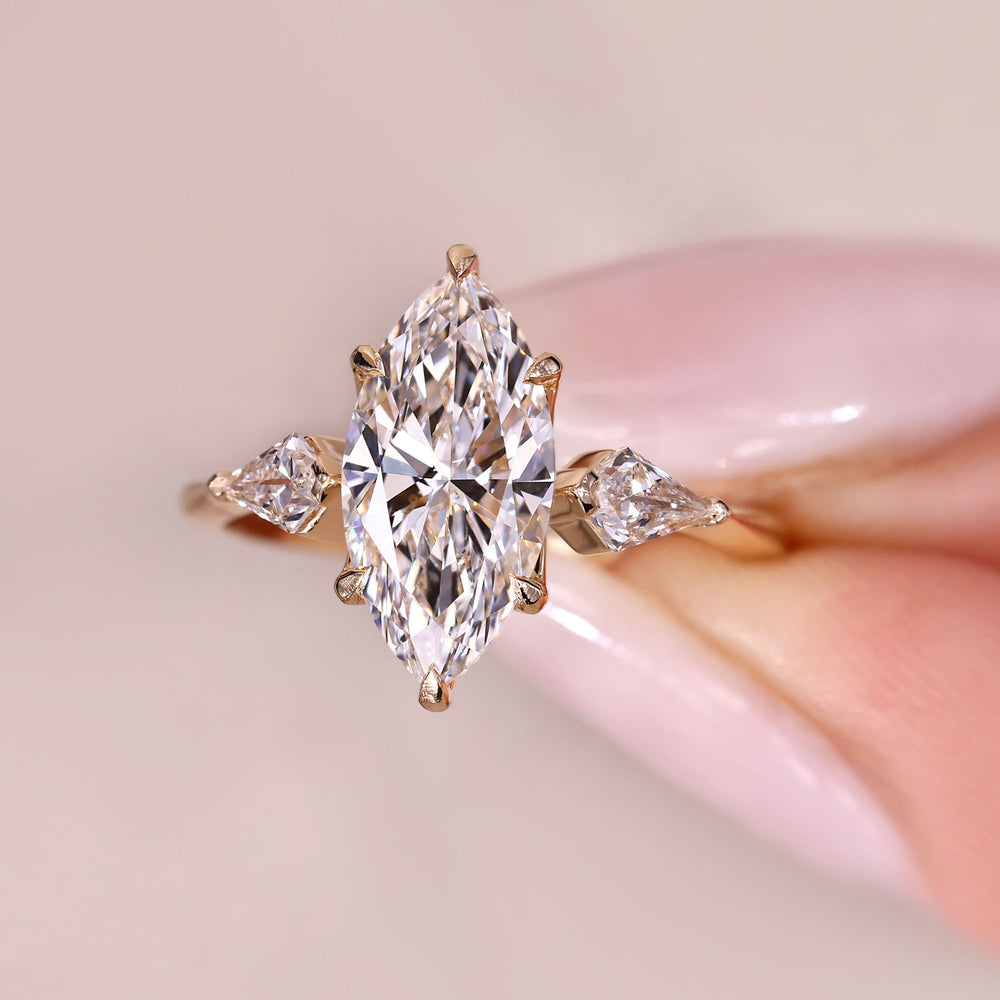 Lab grown marquise diamond ring with refined setting.