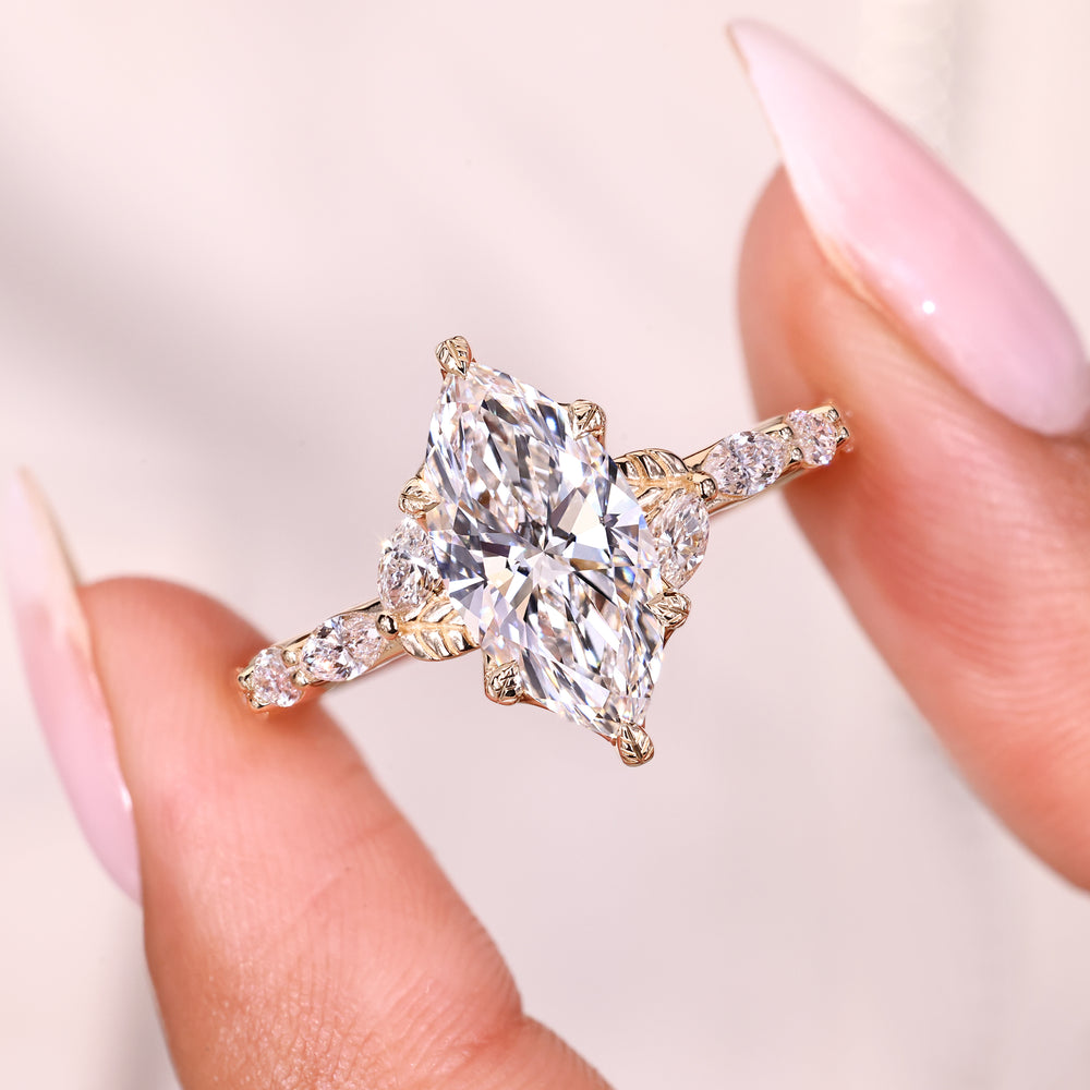 Marquise cut ring with pave setting style.
