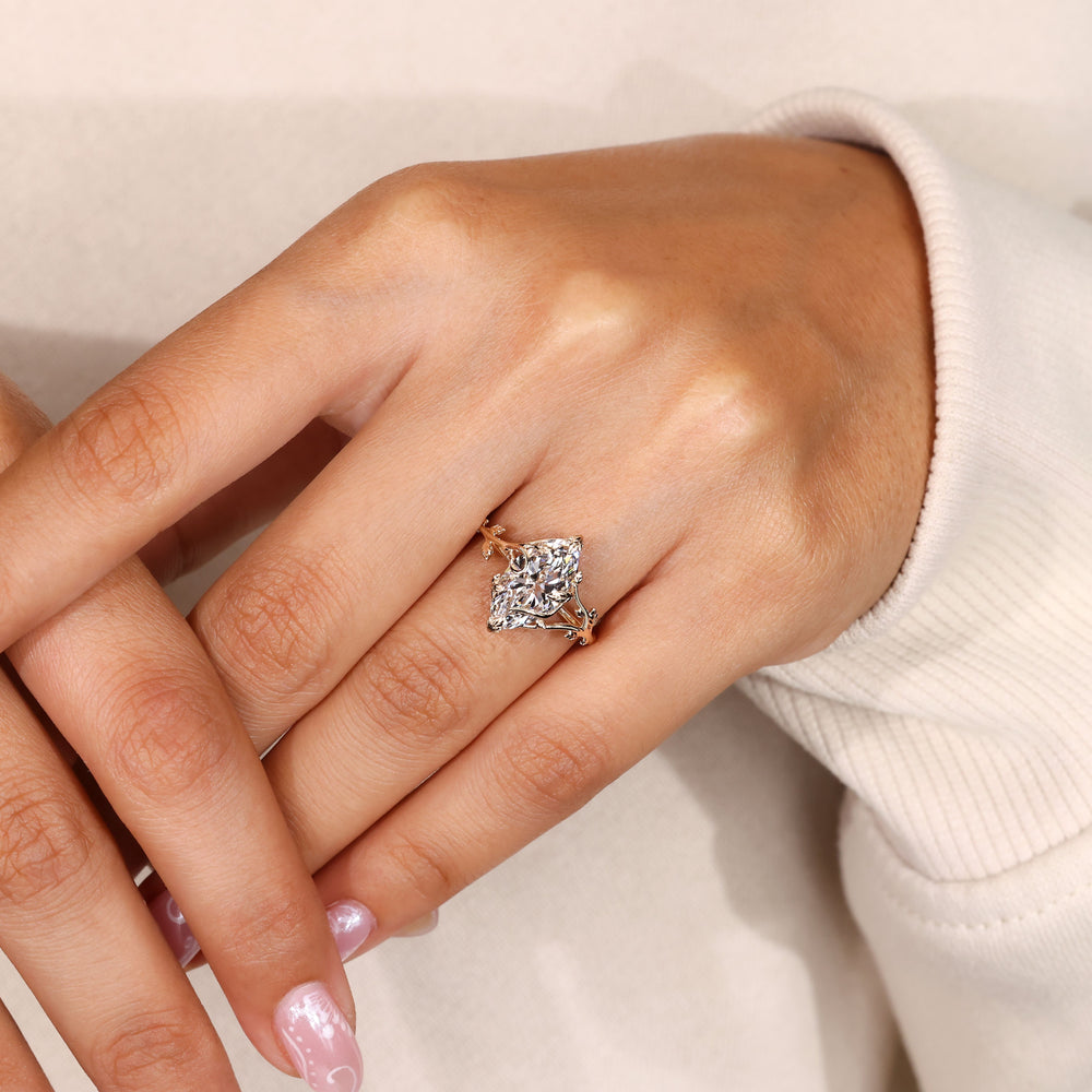 Nature inspired marquise ring with leaf details.
