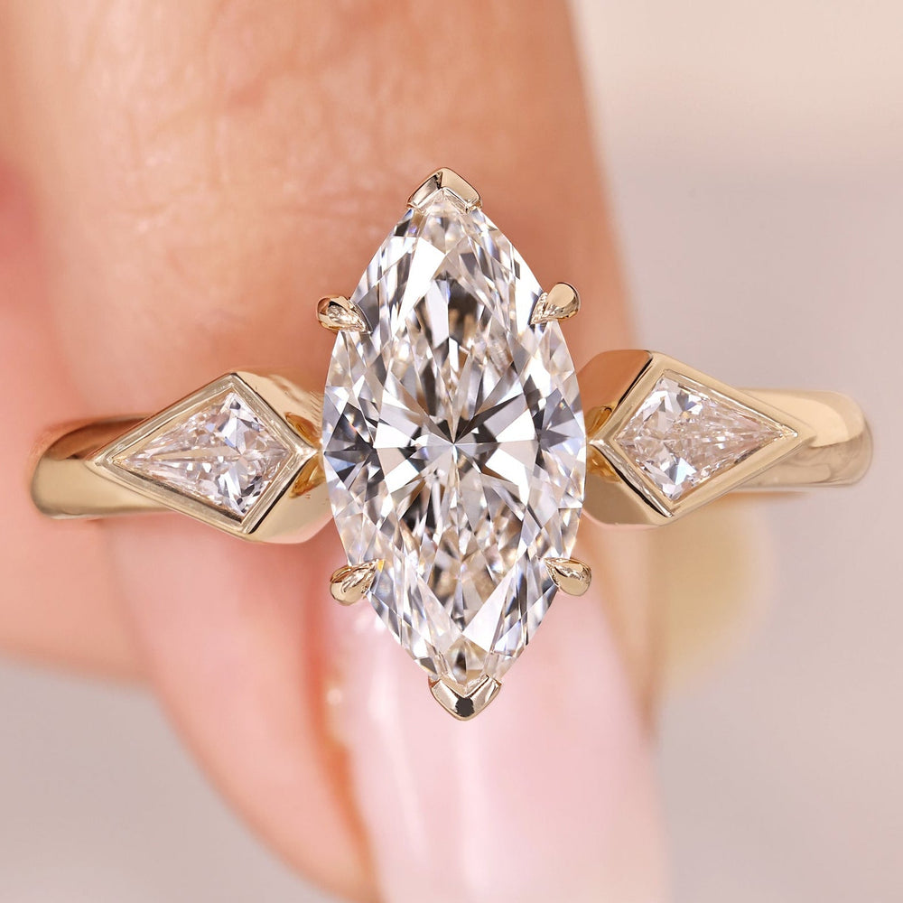 Marquise Diamond Ring three stone style.
