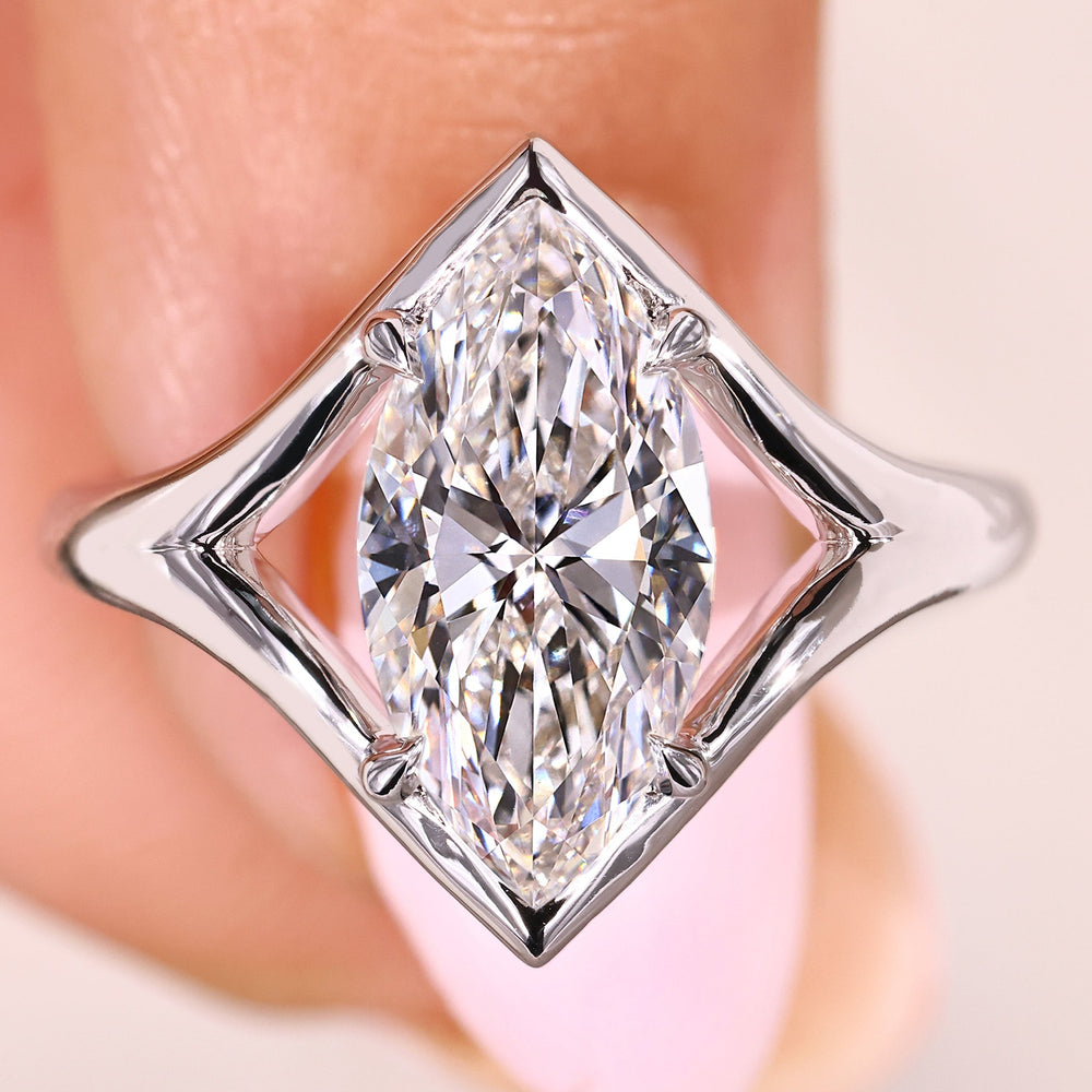 Marquise diamond ring with split shank solitaire setting style
