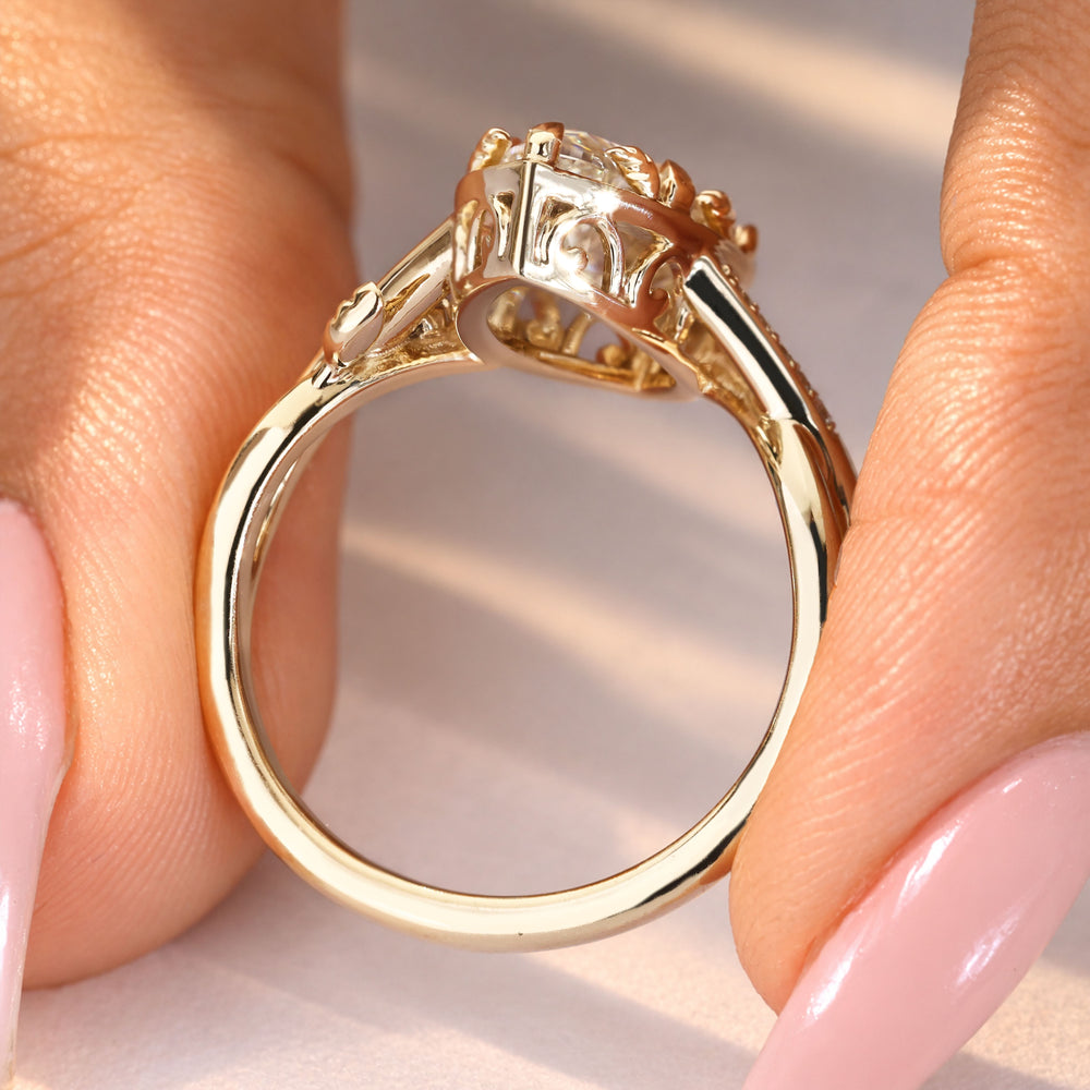 Nature inspired marquise ring with vine detailing.
